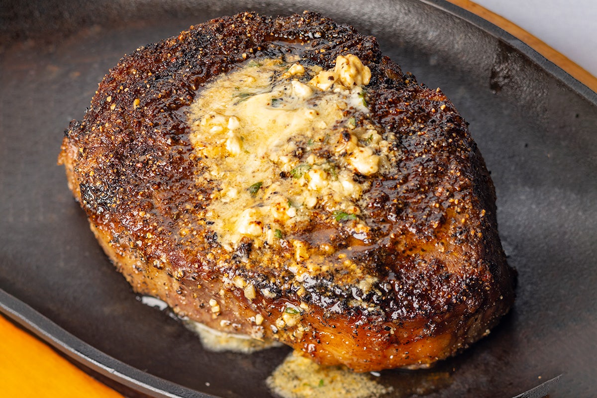 Order Prime Ribeye, 14 OZ* | GF food online from Perry Steakhouse & Grille store, Houston on bringmethat.com