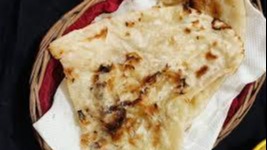 Order Butter Naan food online from Jaipur Palace store, Austin on bringmethat.com