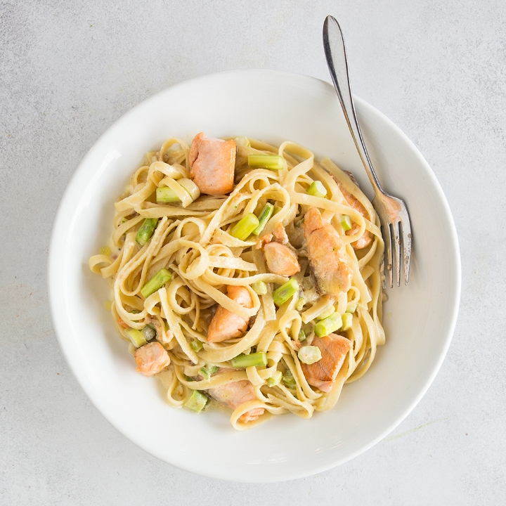 Order Fettuccine With Salmon & Asparagus food online from Central Perk Cafe store, Cedarhurst on bringmethat.com