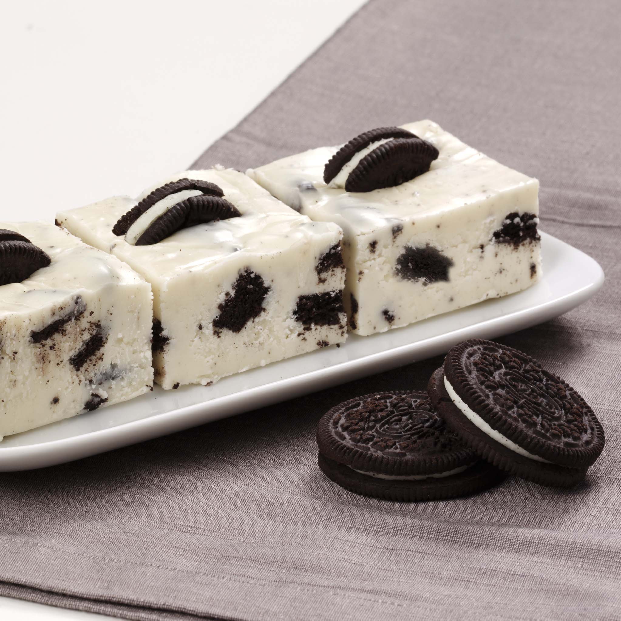 Order Cookies and Cream Fudge food online from Russell Stover Chocolates store, Omaha on bringmethat.com