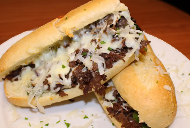 Order Philly Cheese Steak Sandwich food online from Stefano's Brooklyn Pizza store, Harlingen on bringmethat.com