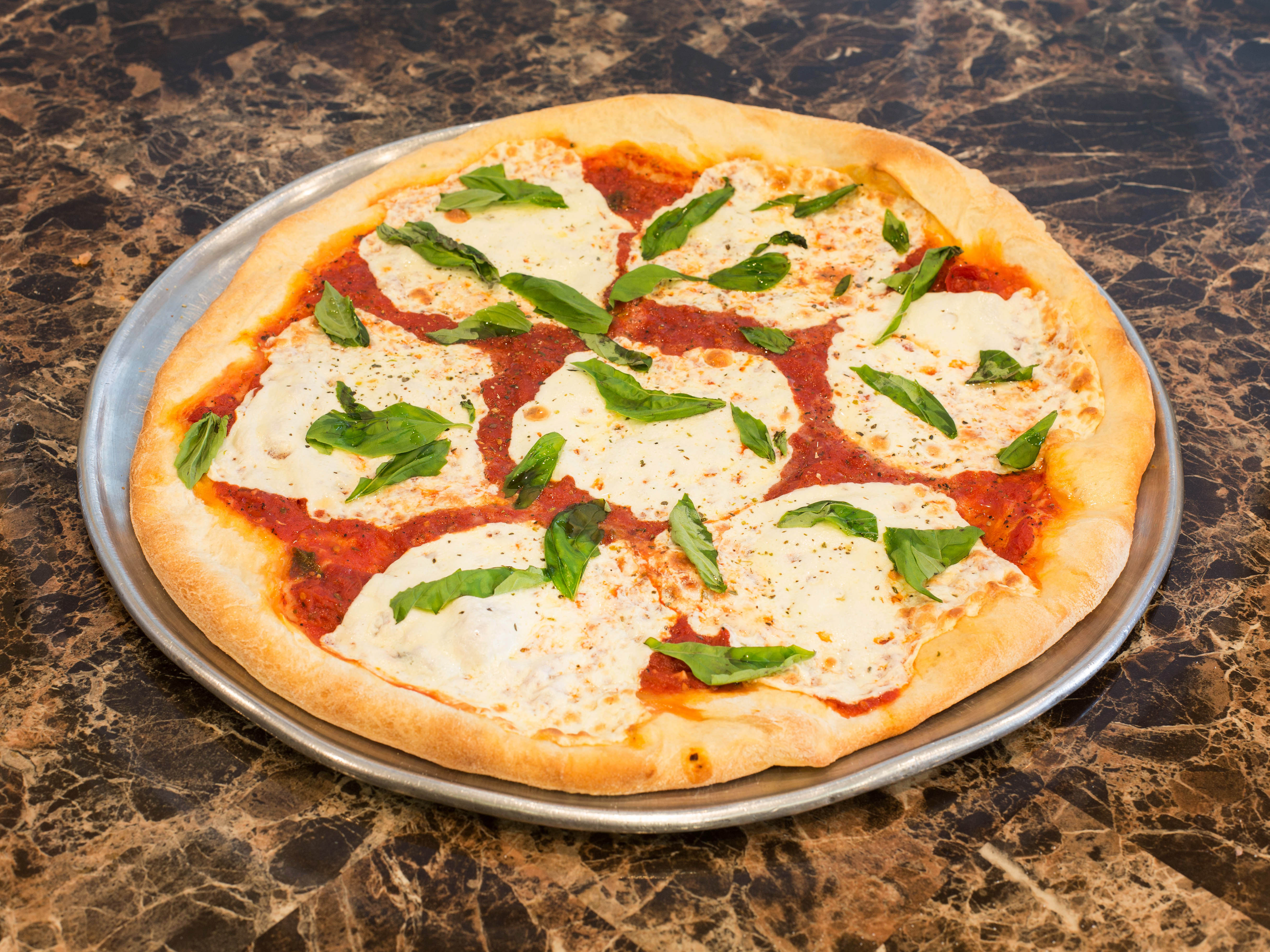 Order Margherita Pizza food online from Calabria Pizzeria store, Cranford NJ on bringmethat.com