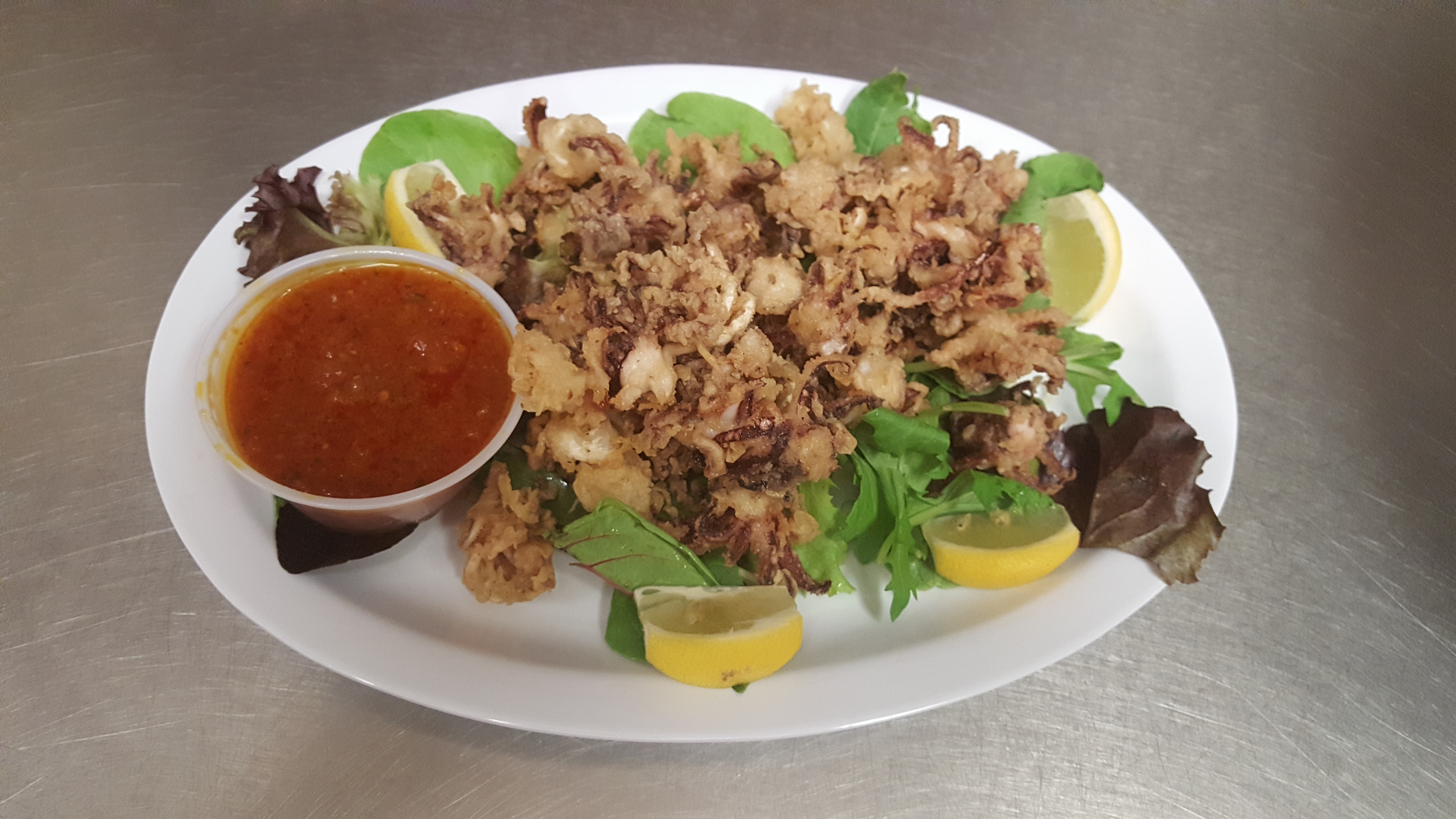 Order Fried Calamari food online from Pizzarelli's Pizza store, Scarsdale on bringmethat.com