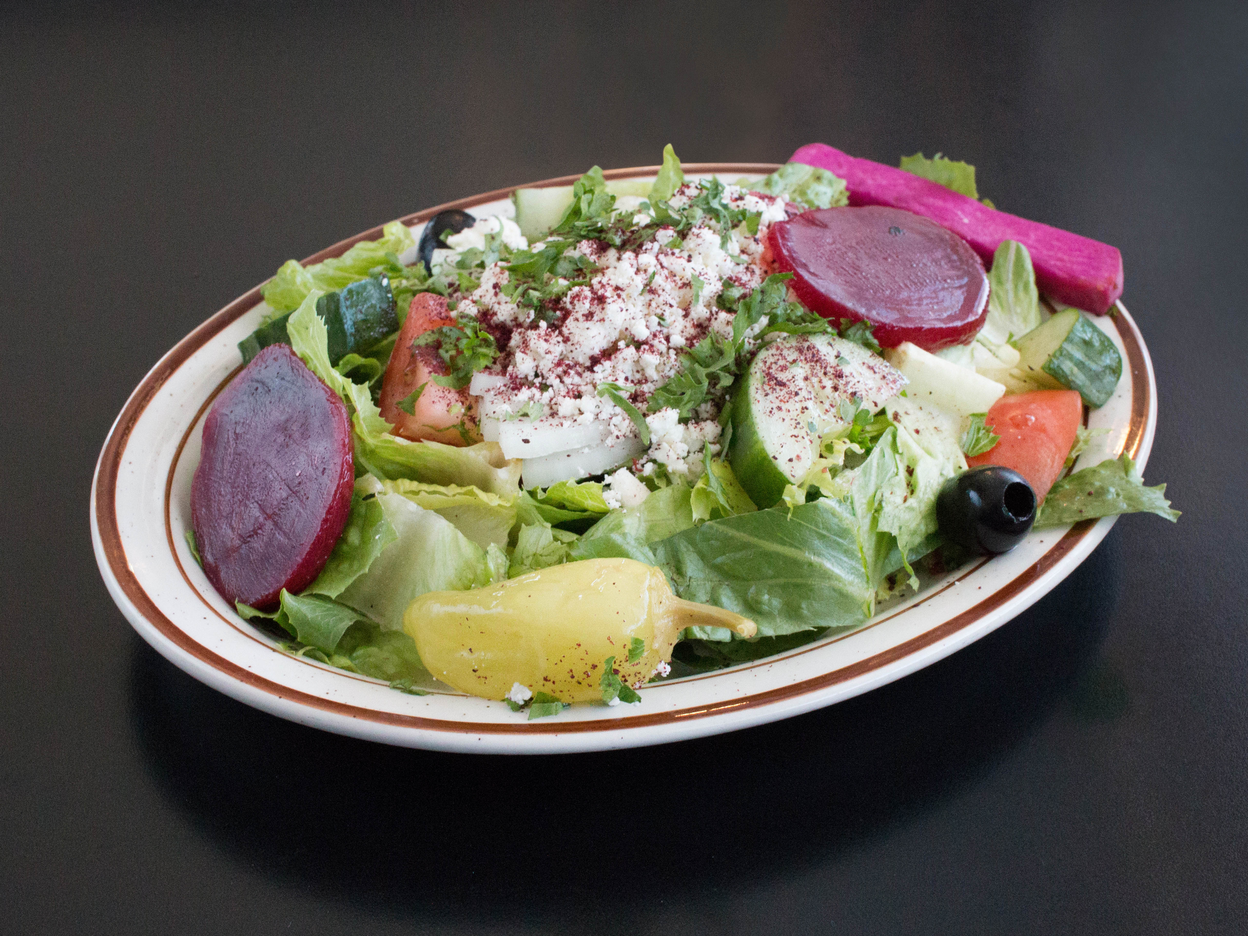 Order Greek Salad food online from Shish Kabob Express store, Southfield on bringmethat.com