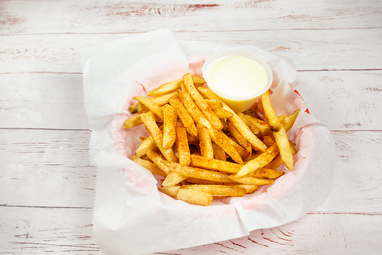 Order Spicy Old Bay Fries food online from Del Rossi's Cheesesteak Co. store, Philadelphia on bringmethat.com