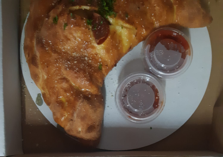 Order Calzone food online from Rocco's Little Chicago store, Tucson on bringmethat.com