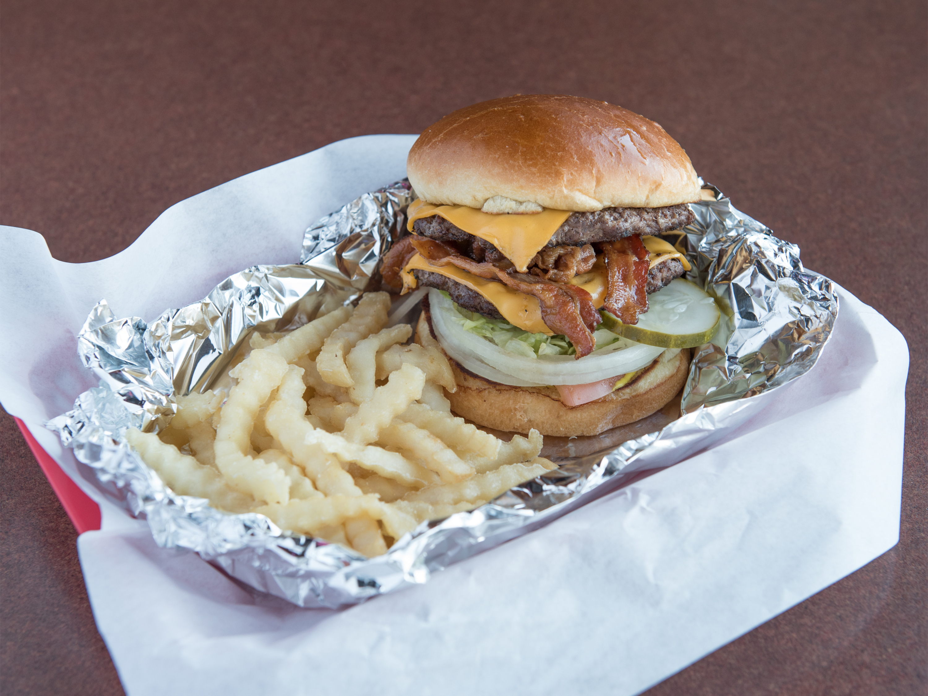 Order 1/2 lb. Double Cheese Burger food online from Johnny's Red Hots store, Naperville on bringmethat.com