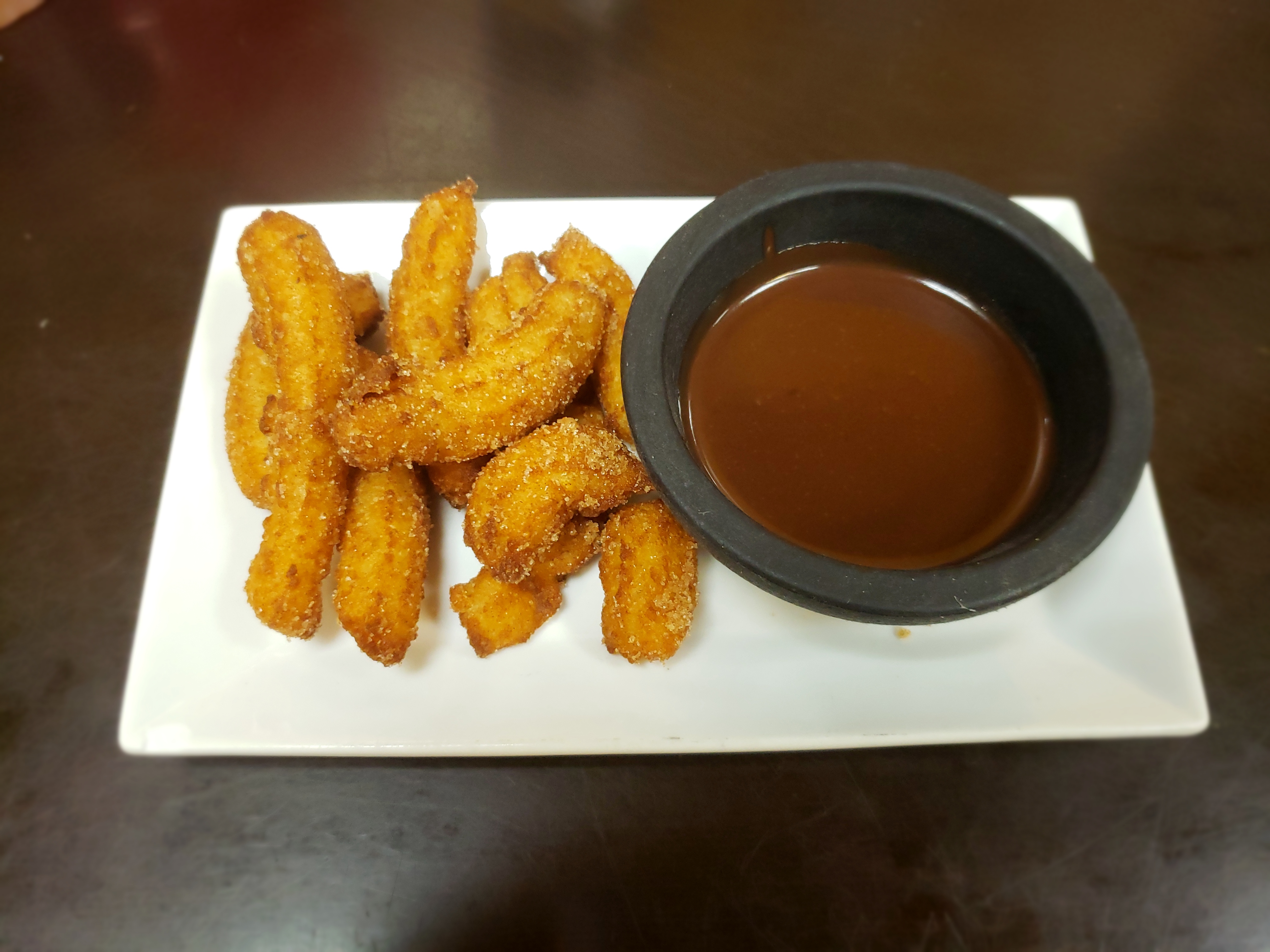 Order NEW NEW homemade churros with chocolate sauce!!! food online from Pique 86 Restaurant store, Bronx on bringmethat.com
