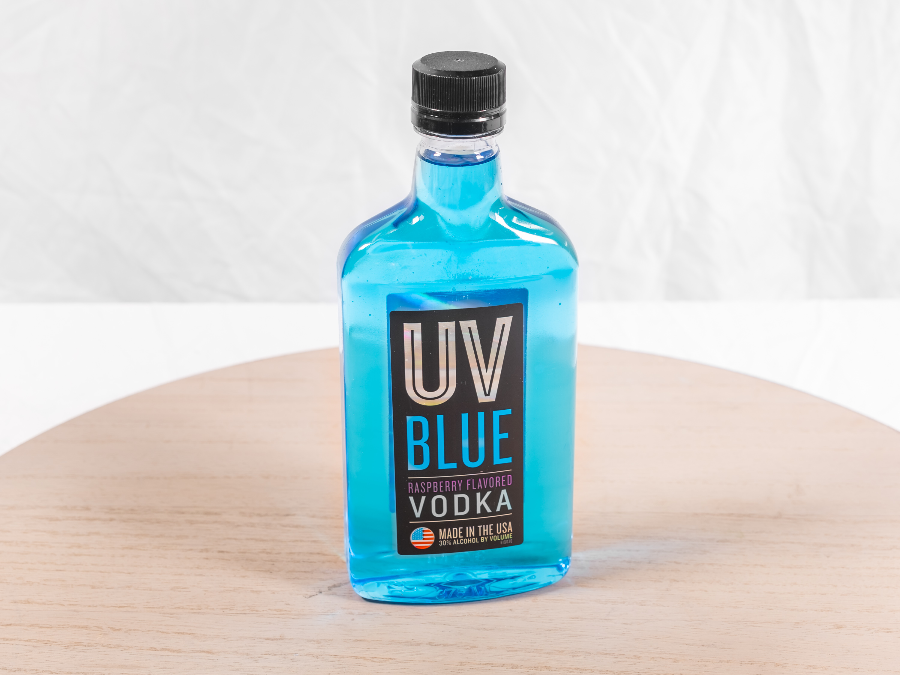 Order 375 ml. UV Blue Vodka food online from M & G Market store, Highland on bringmethat.com