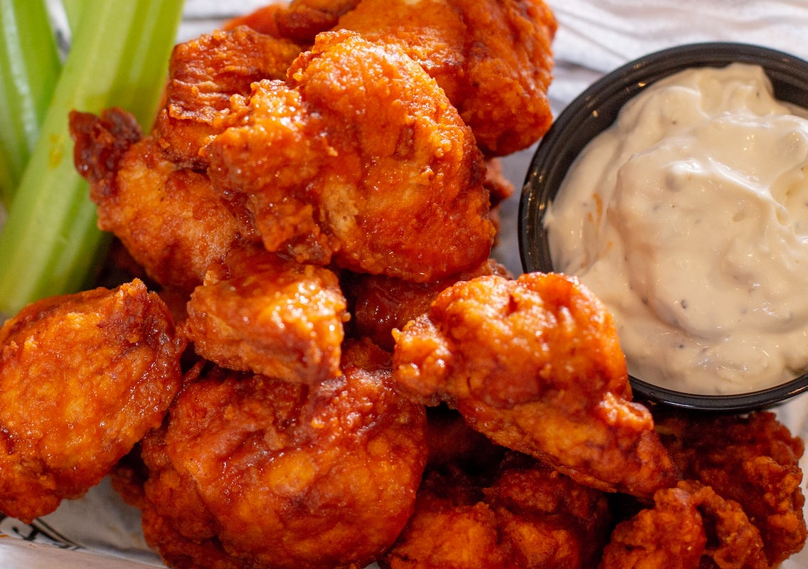 Order Traditional Bone-In Wings food online from Boulder Tap House store, Mankato on bringmethat.com