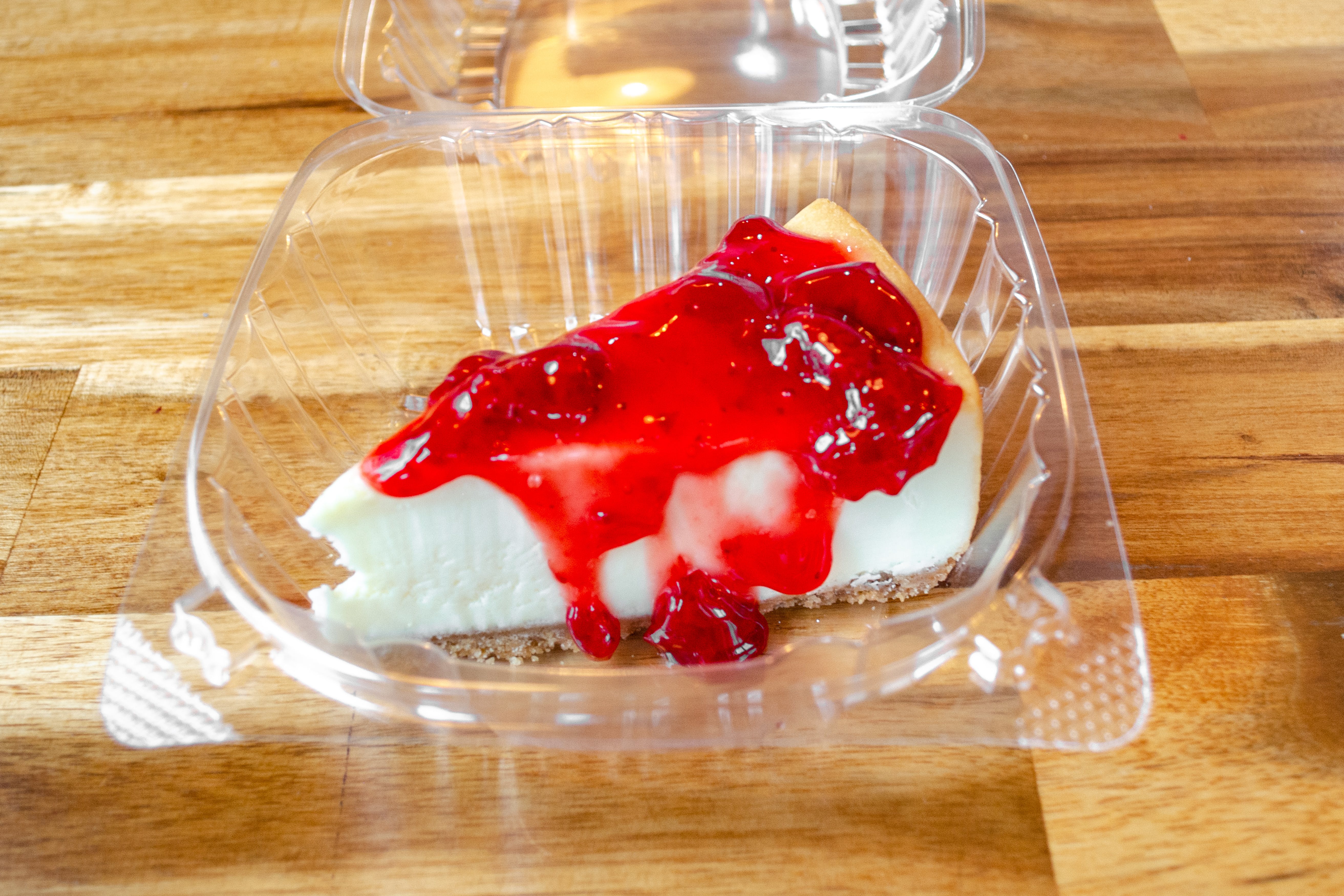 Order NY Style Cheesecake - Dessert food online from Rays Pizza store, Nashville on bringmethat.com