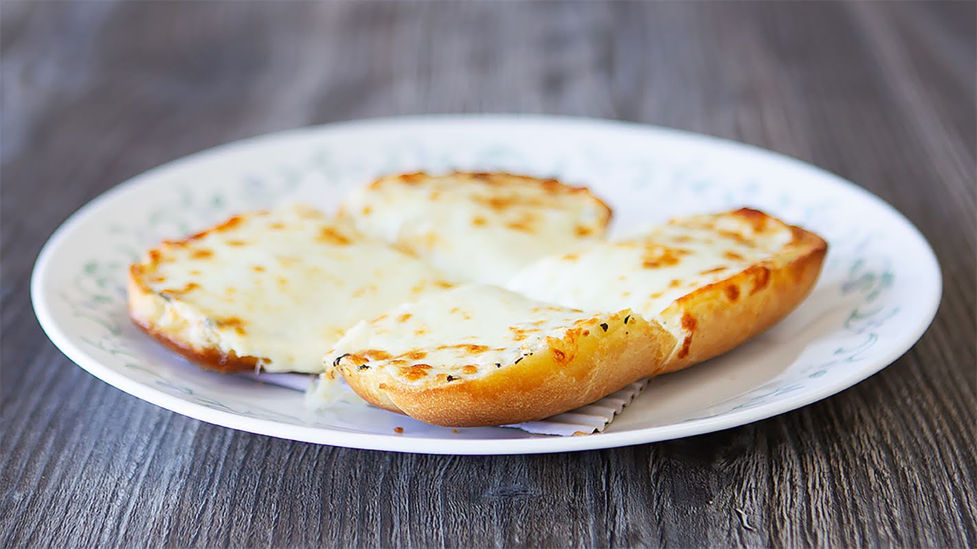 Order Garlic Bread with Cheese food online from Got2go Pizza store, San Jose on bringmethat.com