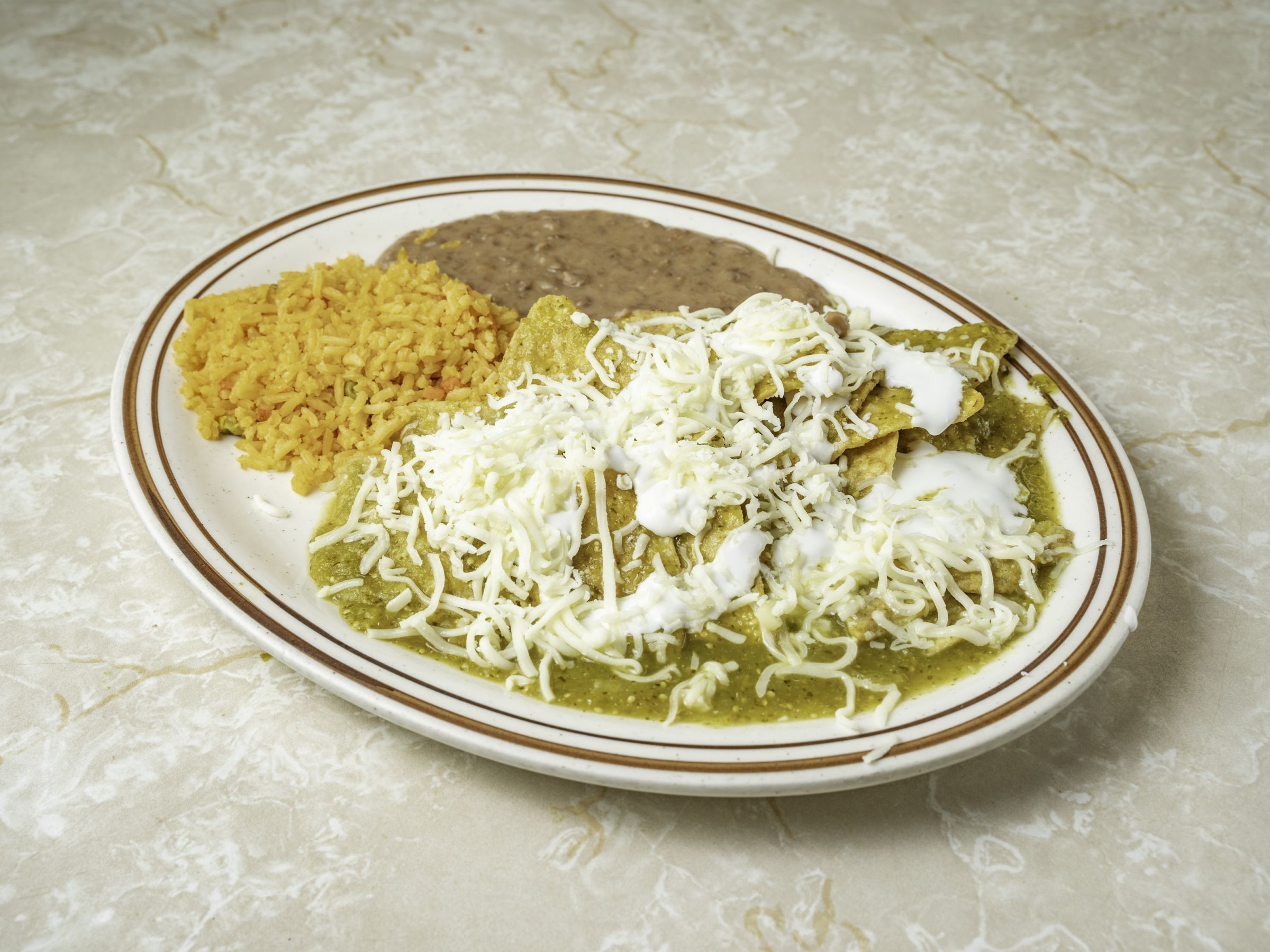 Order Chilaquiles food online from Taqueria Los Comales store, Chicago on bringmethat.com