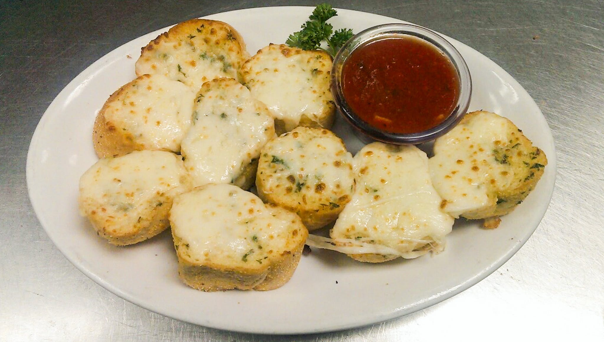 Order Garlic Bread with Cheese - Appetizer food online from Bella Pizza & Pasta store, Mesa on bringmethat.com