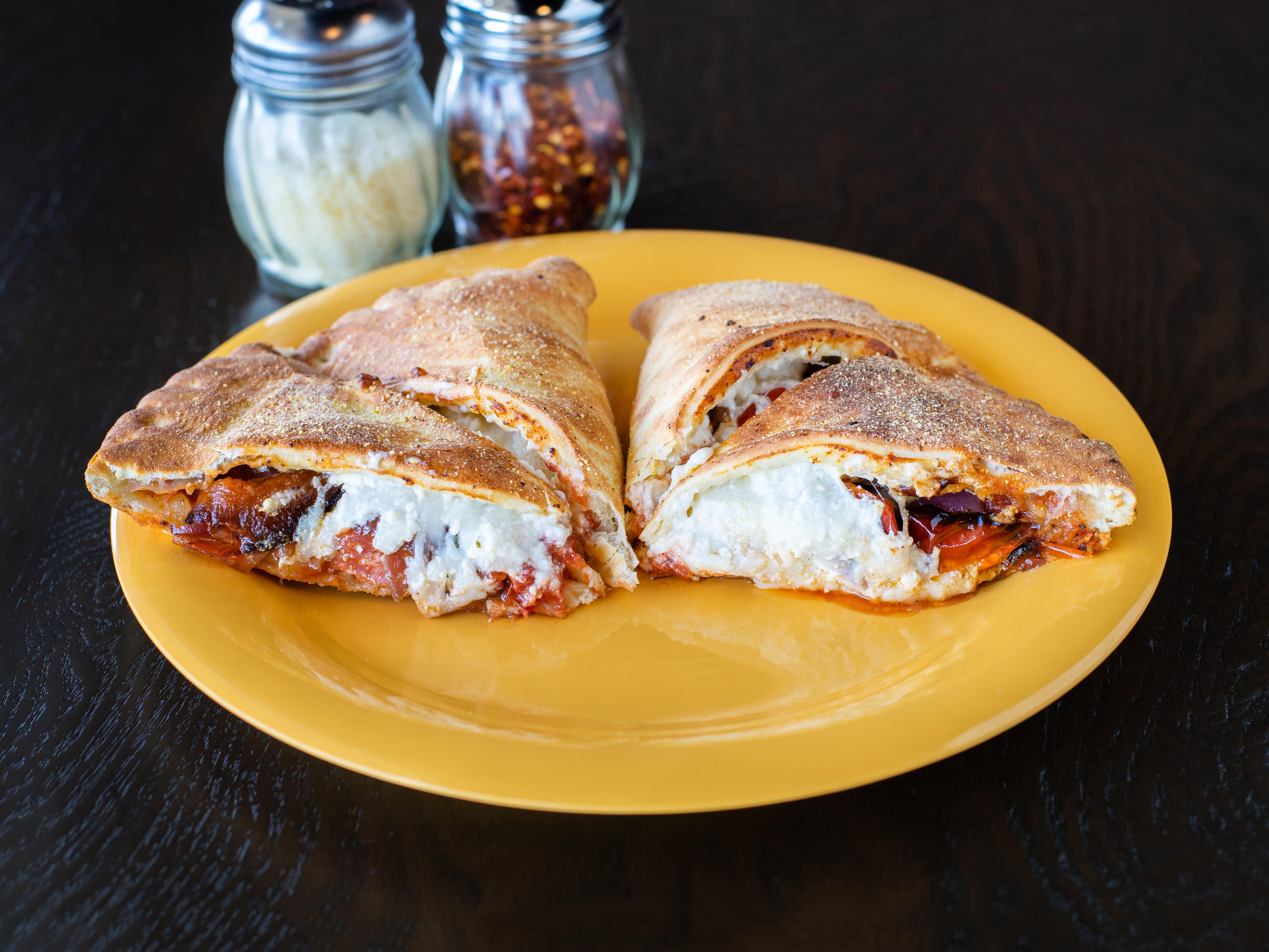 Order Big Wednesday Calzone food online from Extreme Pizza - Nolana Ave store, Mcallen on bringmethat.com
