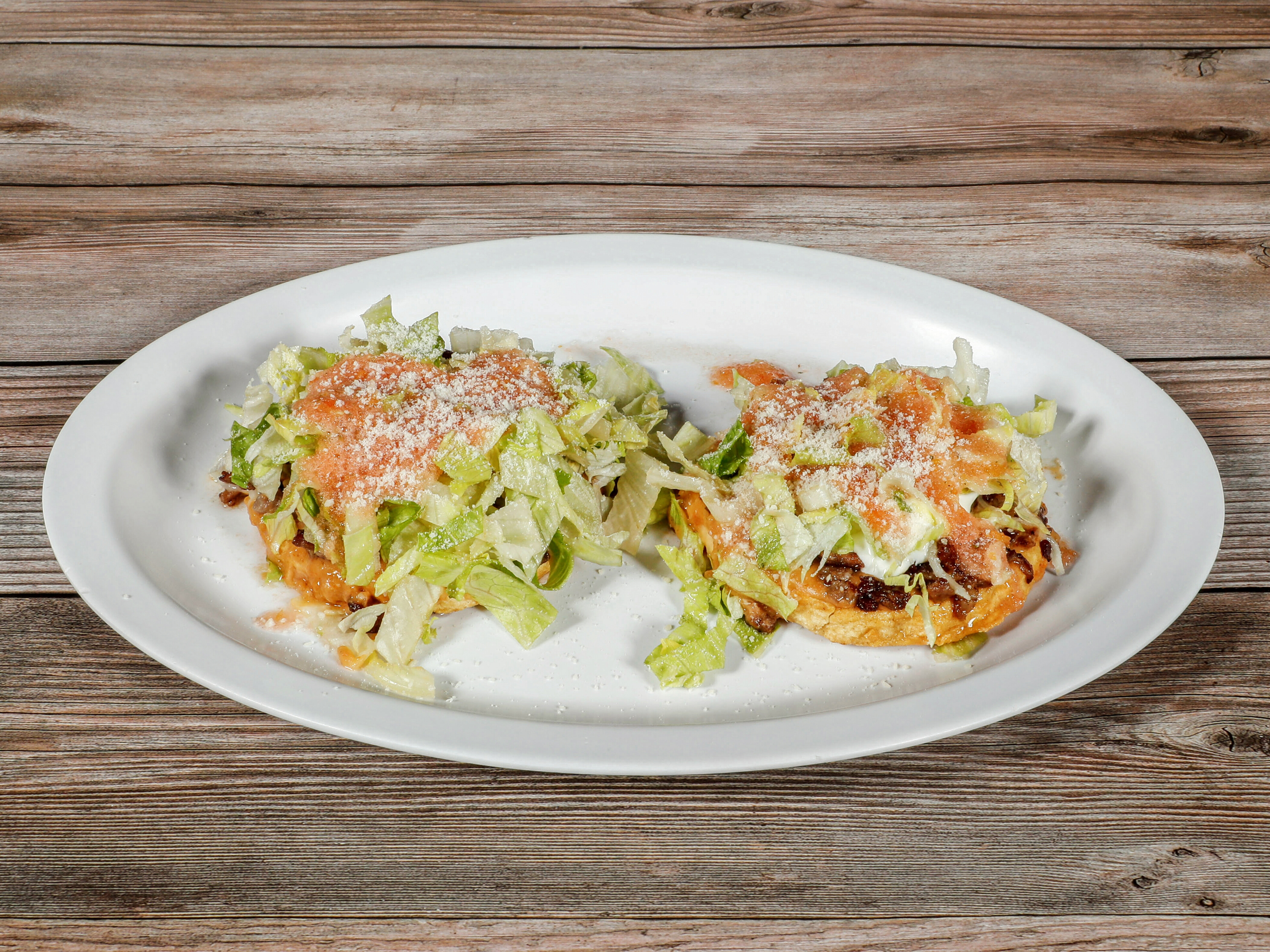 Order 2 Sopes with Rice & Beans food online from La Perla Taqueria Mexican Grill store, Chico on bringmethat.com