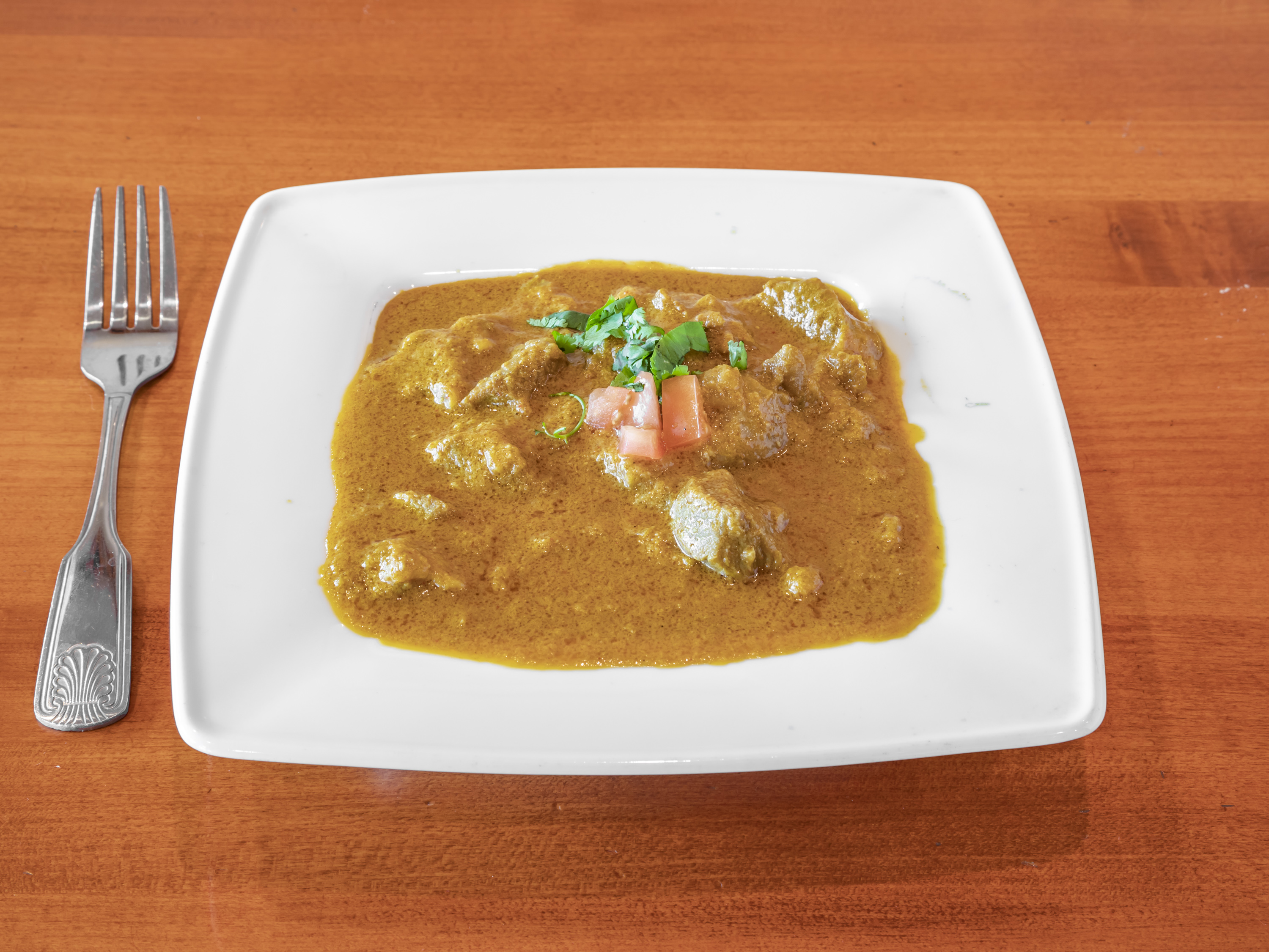 Order Lamb Curry food online from Masala Indian Cuisine store, Scottsdale on bringmethat.com
