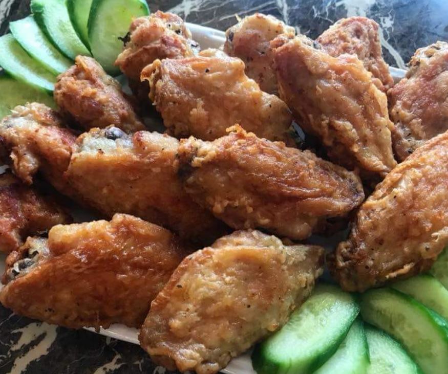 Order A05. Fried Chicken Wings food online from Dragon Palace Chinese Restaurant store, Davenport on bringmethat.com