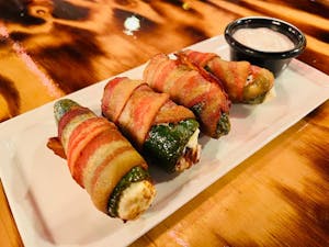 Order 3 Bacon-Wrapped Jalapeños with Cheese food online from Que Tal Pollo store, Independence on bringmethat.com