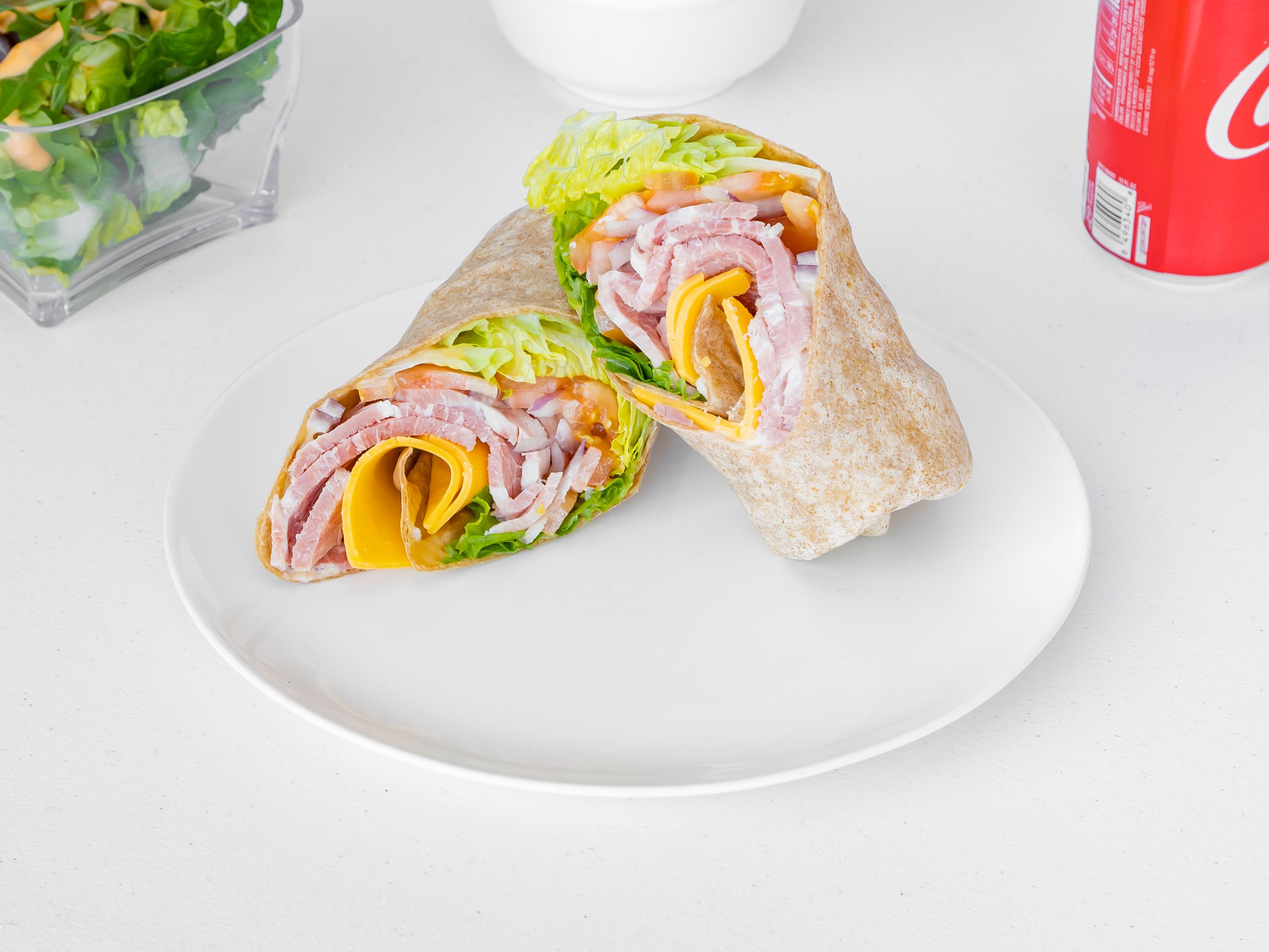 Order HoneyBaked Ham or Roasted Turkey Breast Wrap  -  846/786 cal food online from The Honeybaked Ham Company Of Riverside store, Riverside on bringmethat.com