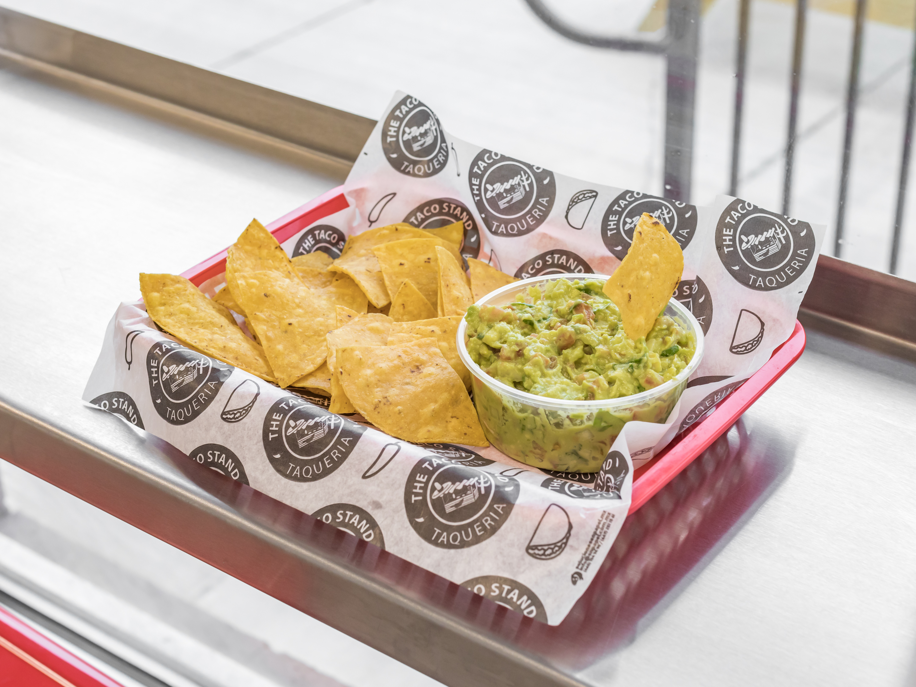 Order Chips and Guacamole food online from The Taco Stand Taqueria store, Taylor on bringmethat.com