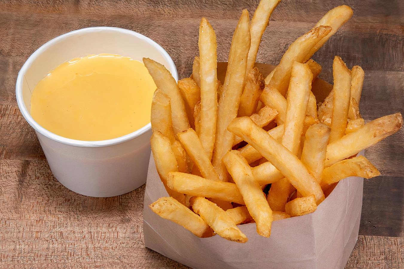 Order CHEESE FRIES food online from Bad Mutha Clucka store, Thousand Oaks on bringmethat.com