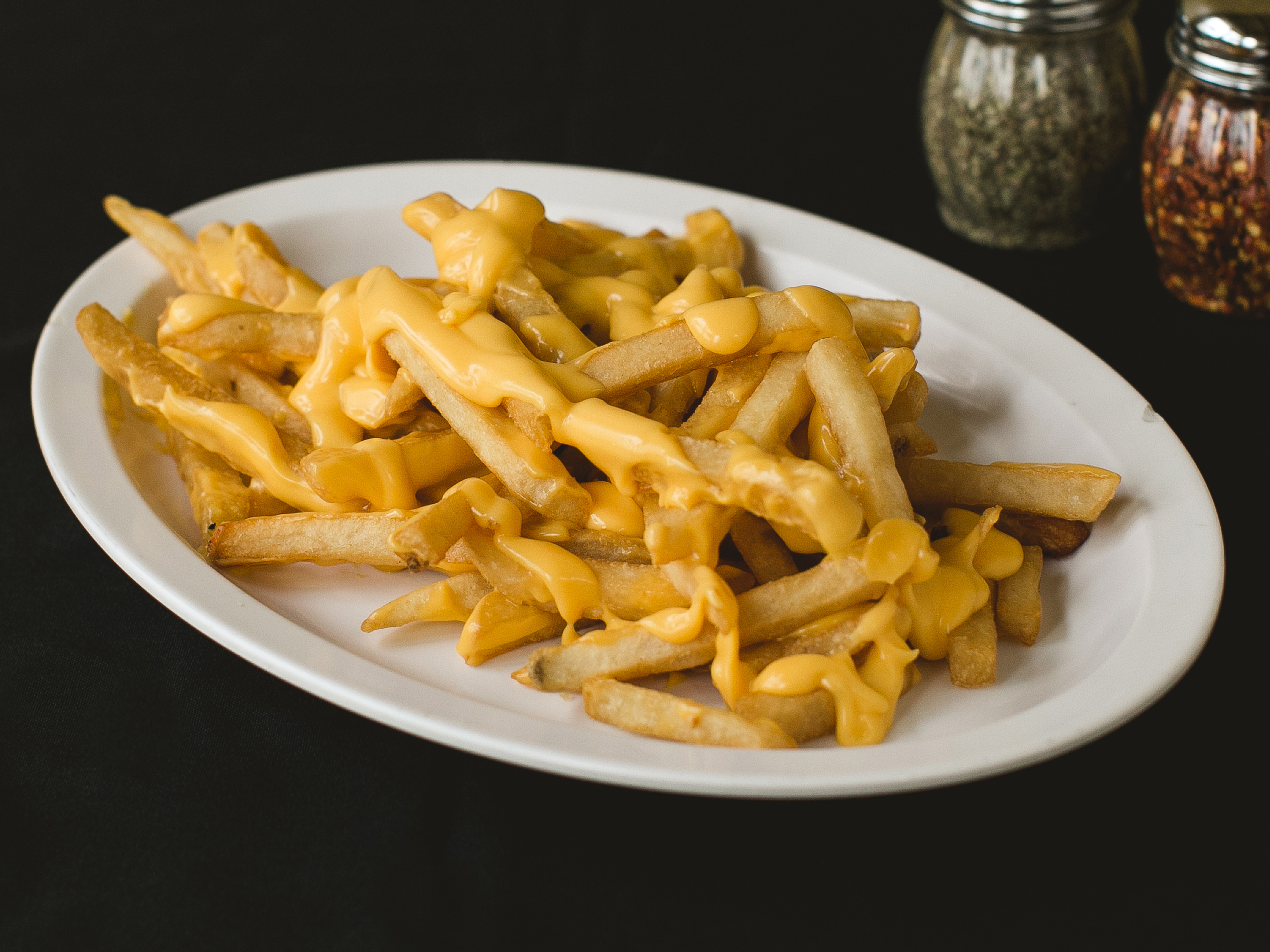 Order Cheese Fries food online from Santi Pizza store, Maple Shade on bringmethat.com