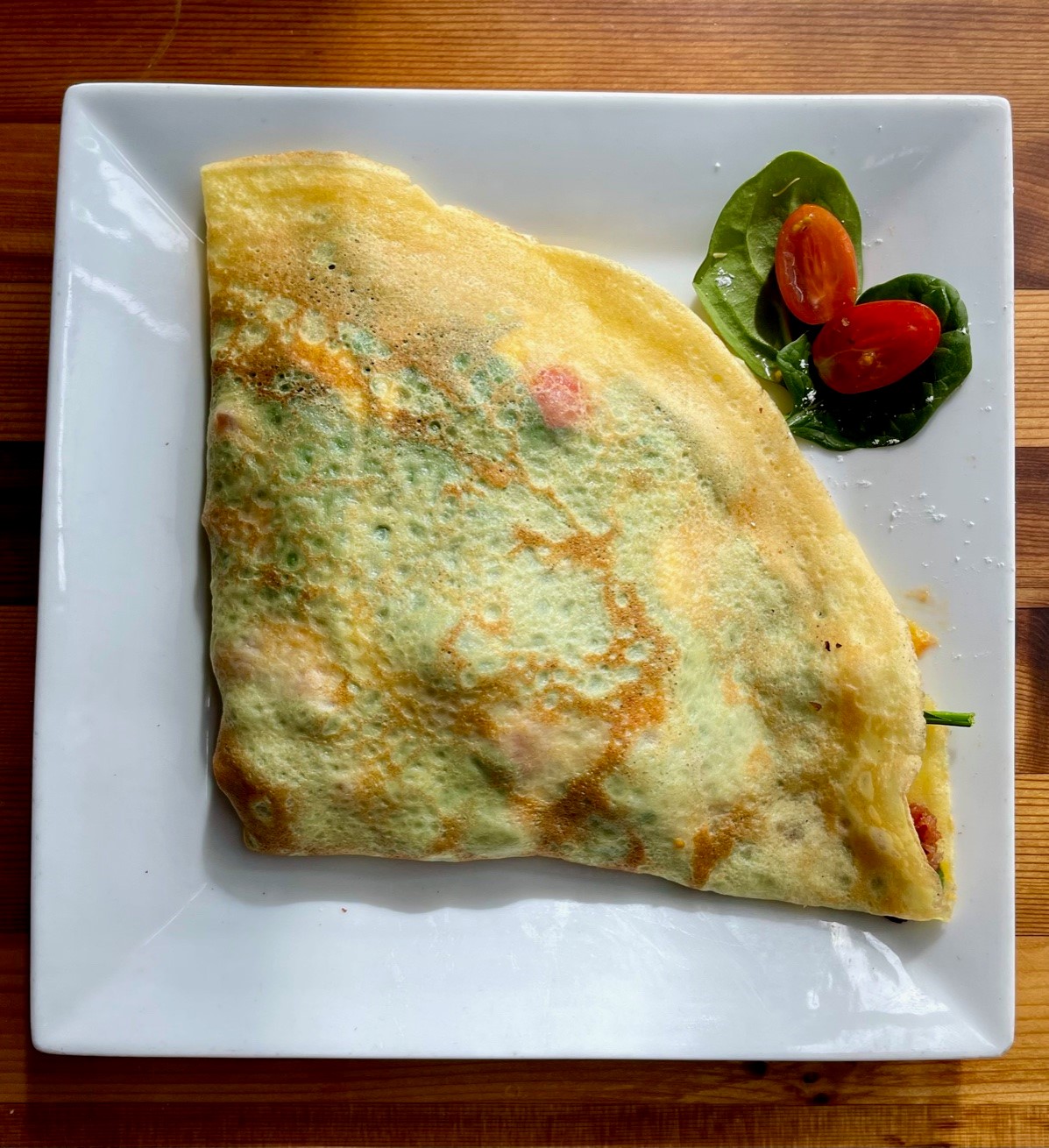 Order Eggs, Bacon, Spinach, Cheddar and Tomato Crepe food online from Hob Coffee San Marcos store, San Marcos on bringmethat.com