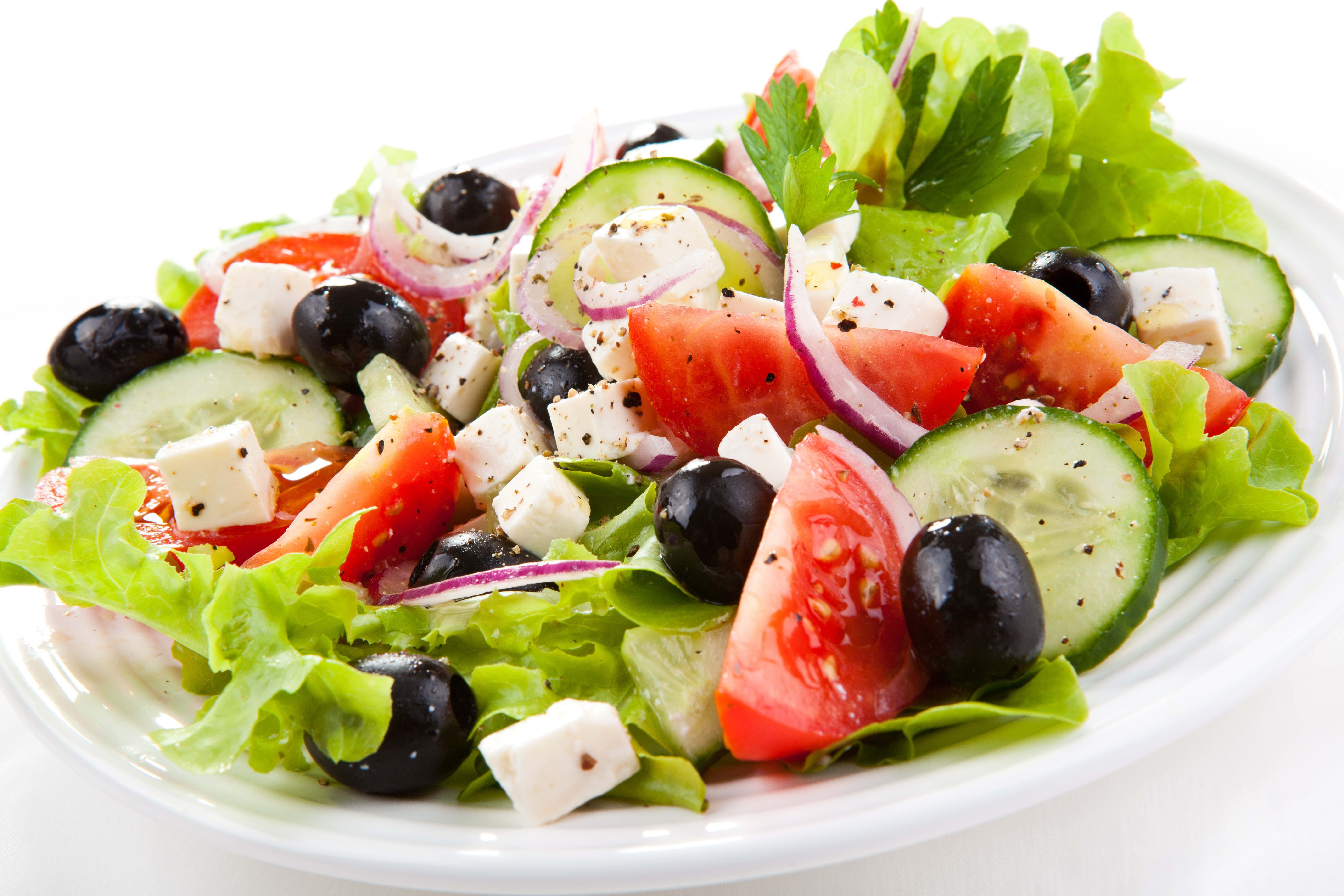 Order Greek Salad - Small food online from Golden Pizzeria store, Norfolk on bringmethat.com