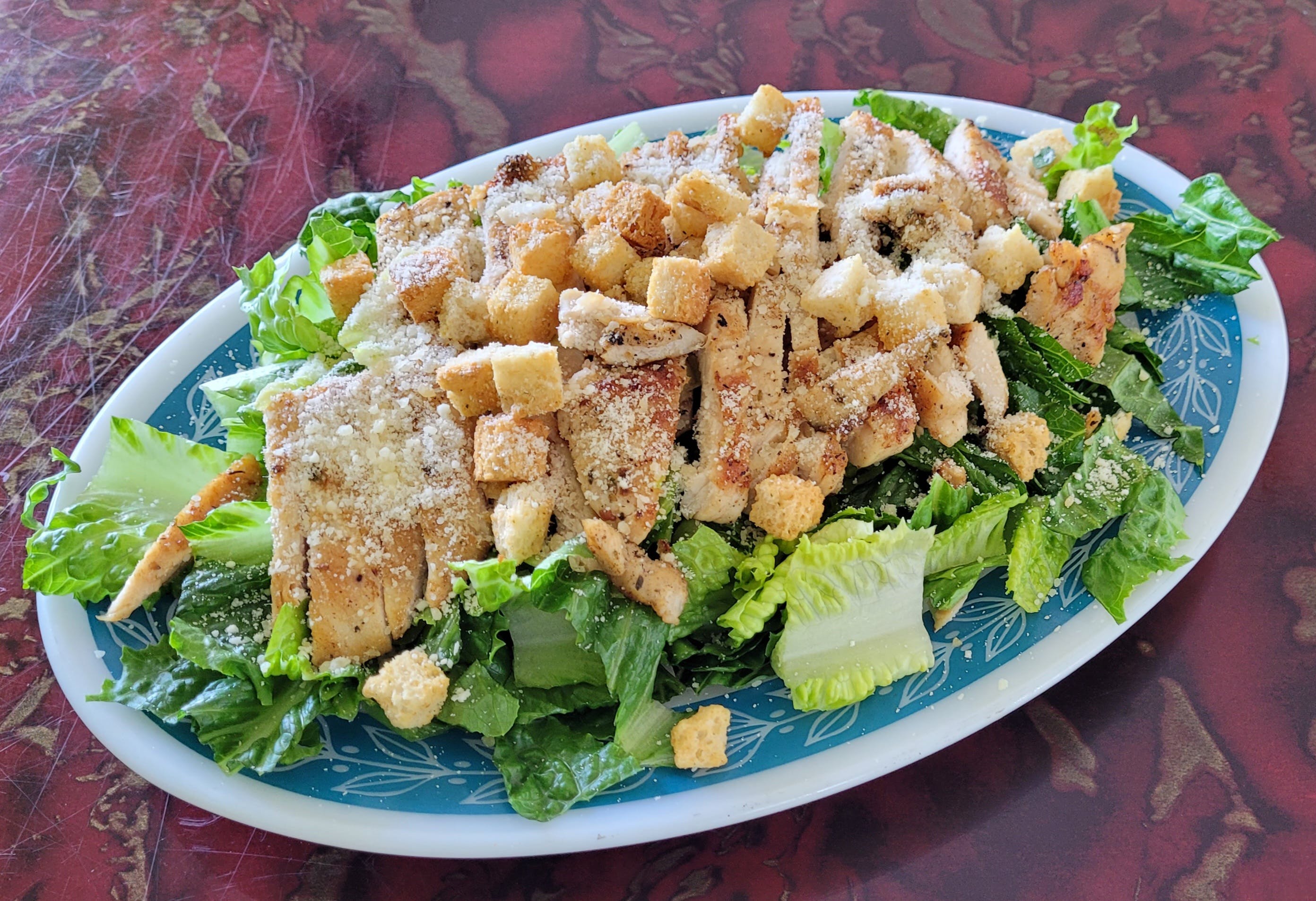 Order Caesar Salad with Grilled Chicken - Small food online from Rhythm And Spice Pizzeria And Grill store, New Brunswick on bringmethat.com