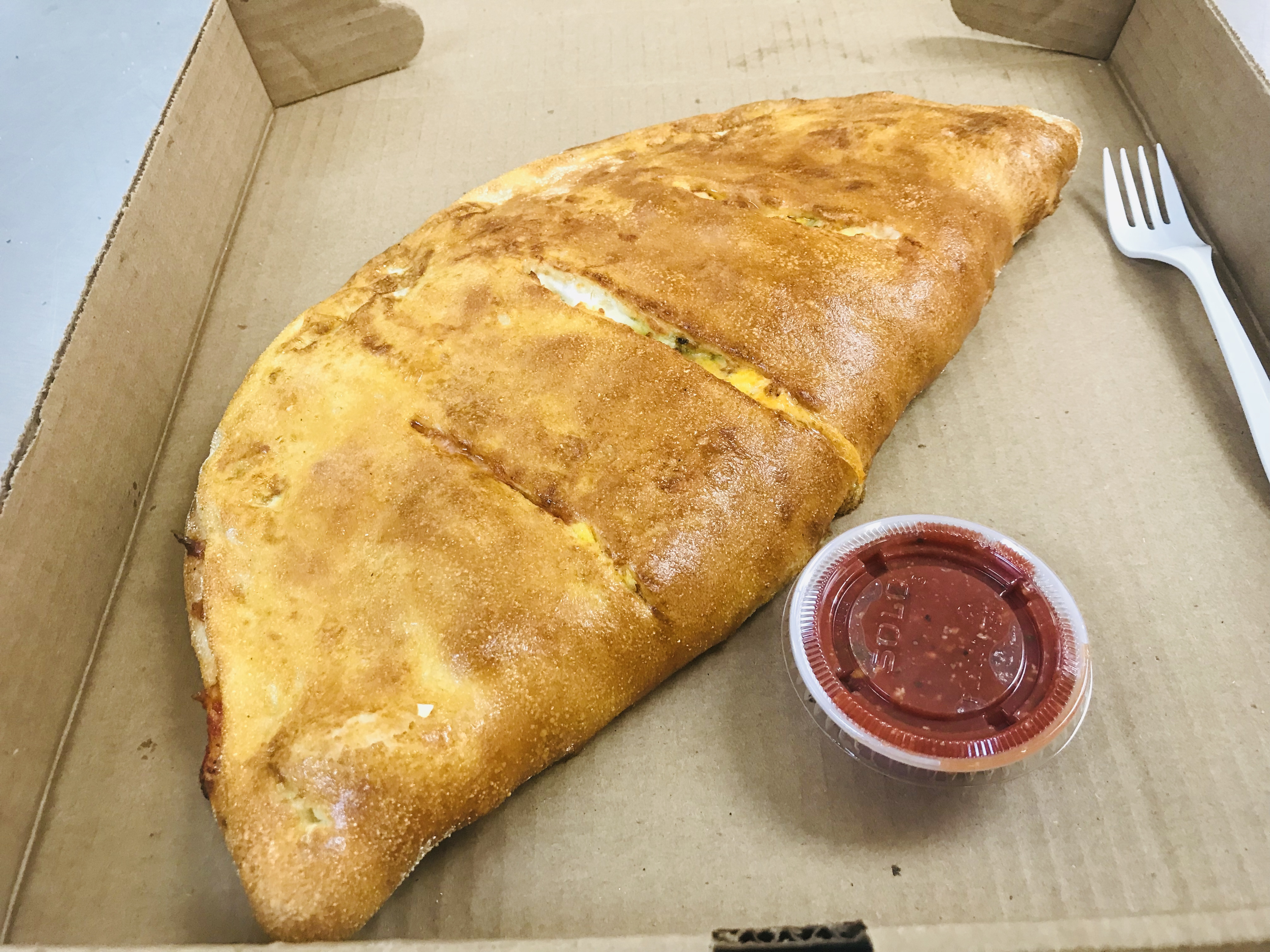 Order Regular stromboli(pepperoni,sausage,marinara sauce & mozzarella cheese) food online from A-1 Deli And Fried Chicken store, Wilmington on bringmethat.com