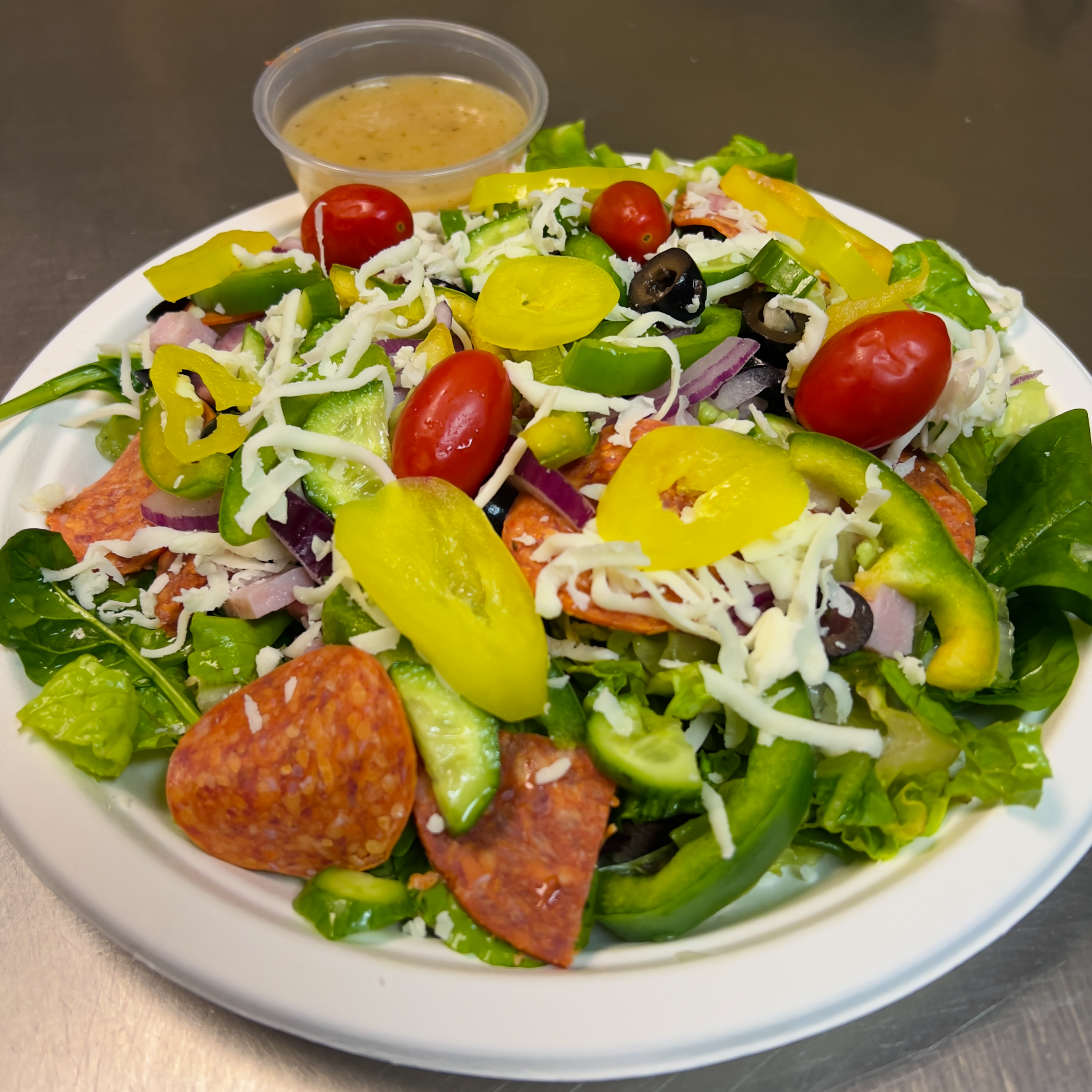 Order Antipasto Salad food online from Noho pizza man store, North Hollywood on bringmethat.com