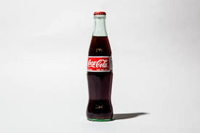 Order Coke Bottle food online from Sababa Mediterranean Cuisine store, Richardson on bringmethat.com