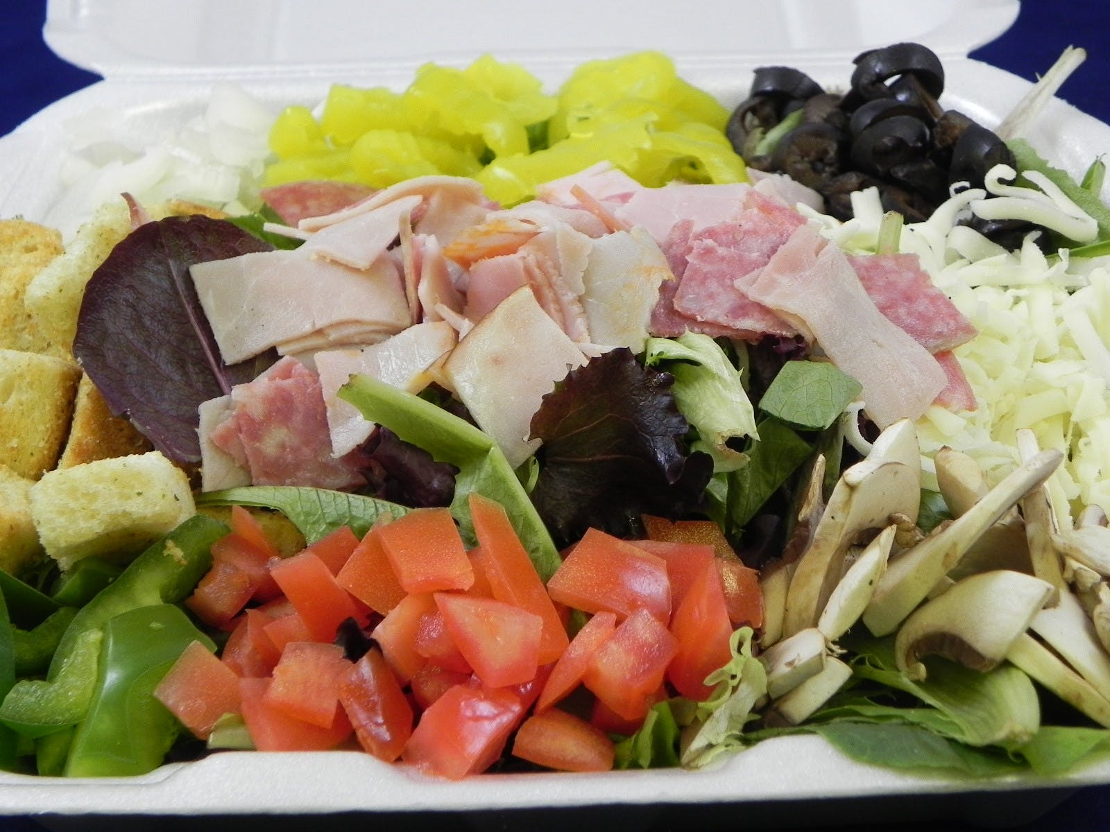 Order Antipasto Salad - Salad food online from Tomatoes store, Carnegie on bringmethat.com