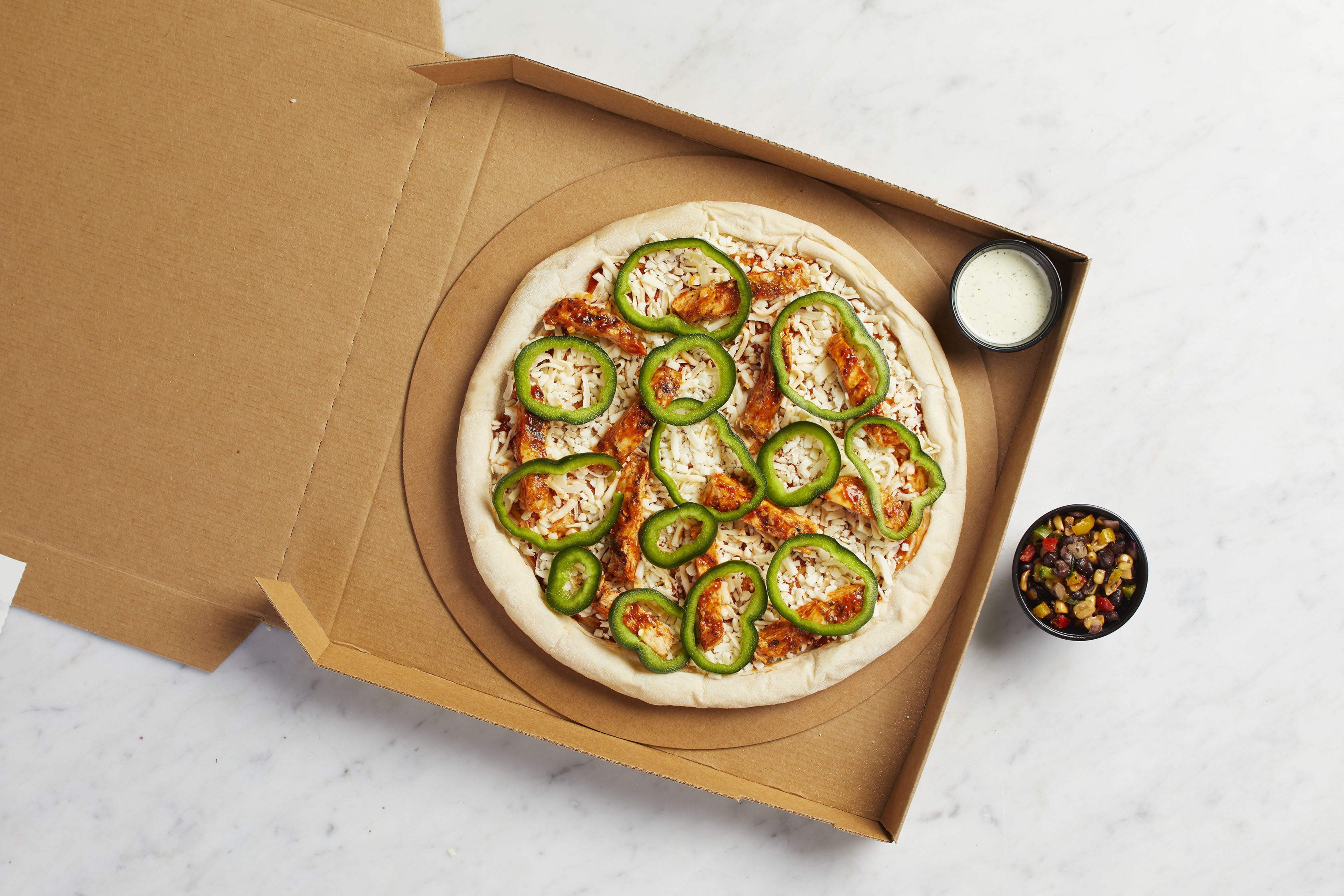 Order Take and Bake Spicy Chipotle Chicken Pizza  food online from California Pizza Kitchen - River City Dr store, Jacksonville on bringmethat.com