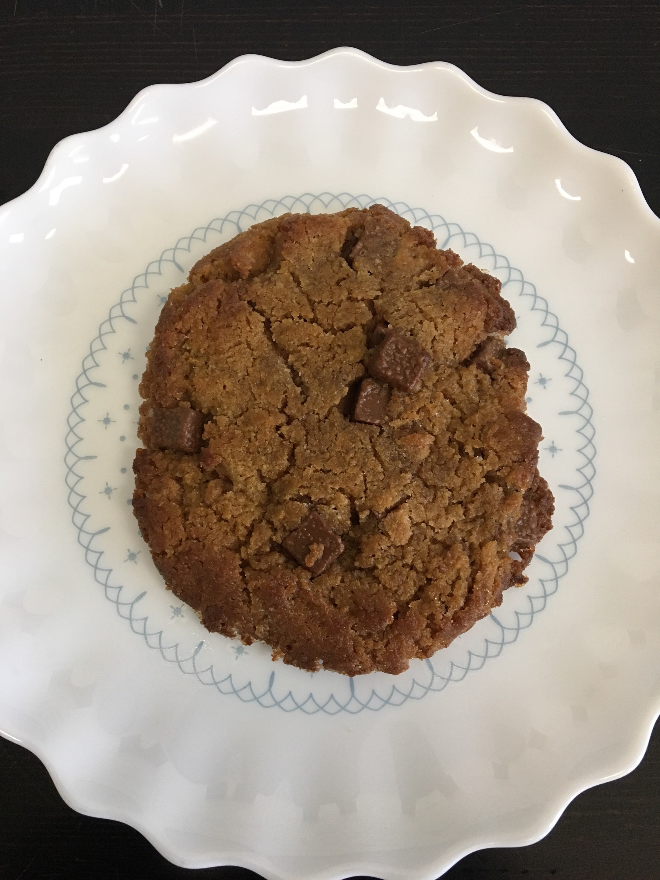 Order Flourless Peanut Butter Milk Chocolate Chunk Cookie food online from Matty J Bakery & Cafe store, Saline on bringmethat.com