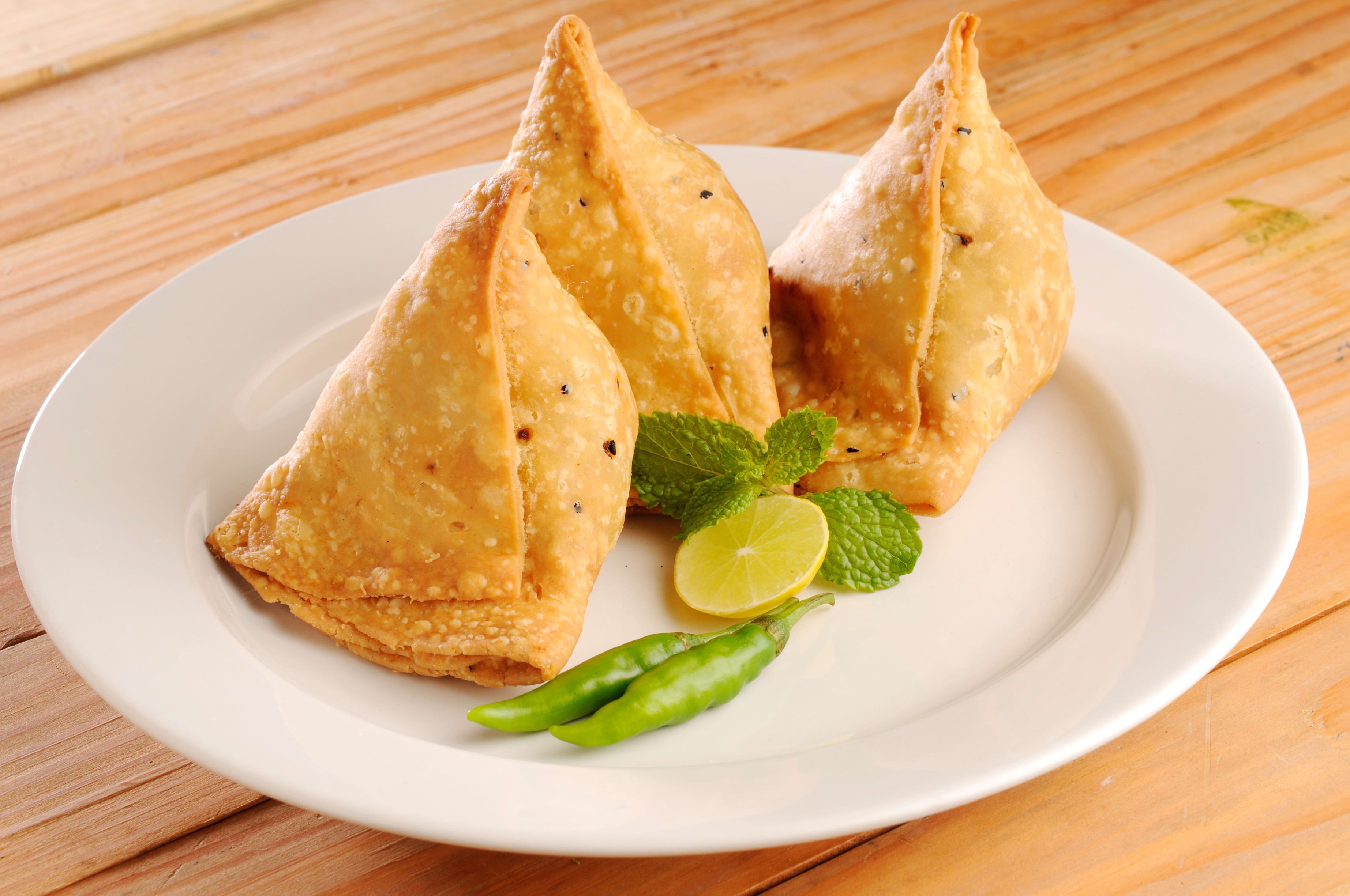 Order Samosa (2pc) food online from Pizza Twist store, Madera on bringmethat.com