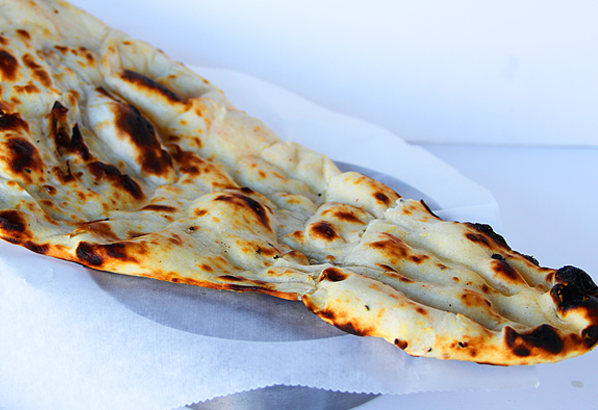 Order Naan food online from Saffron Indian Bistro store, Tucson on bringmethat.com