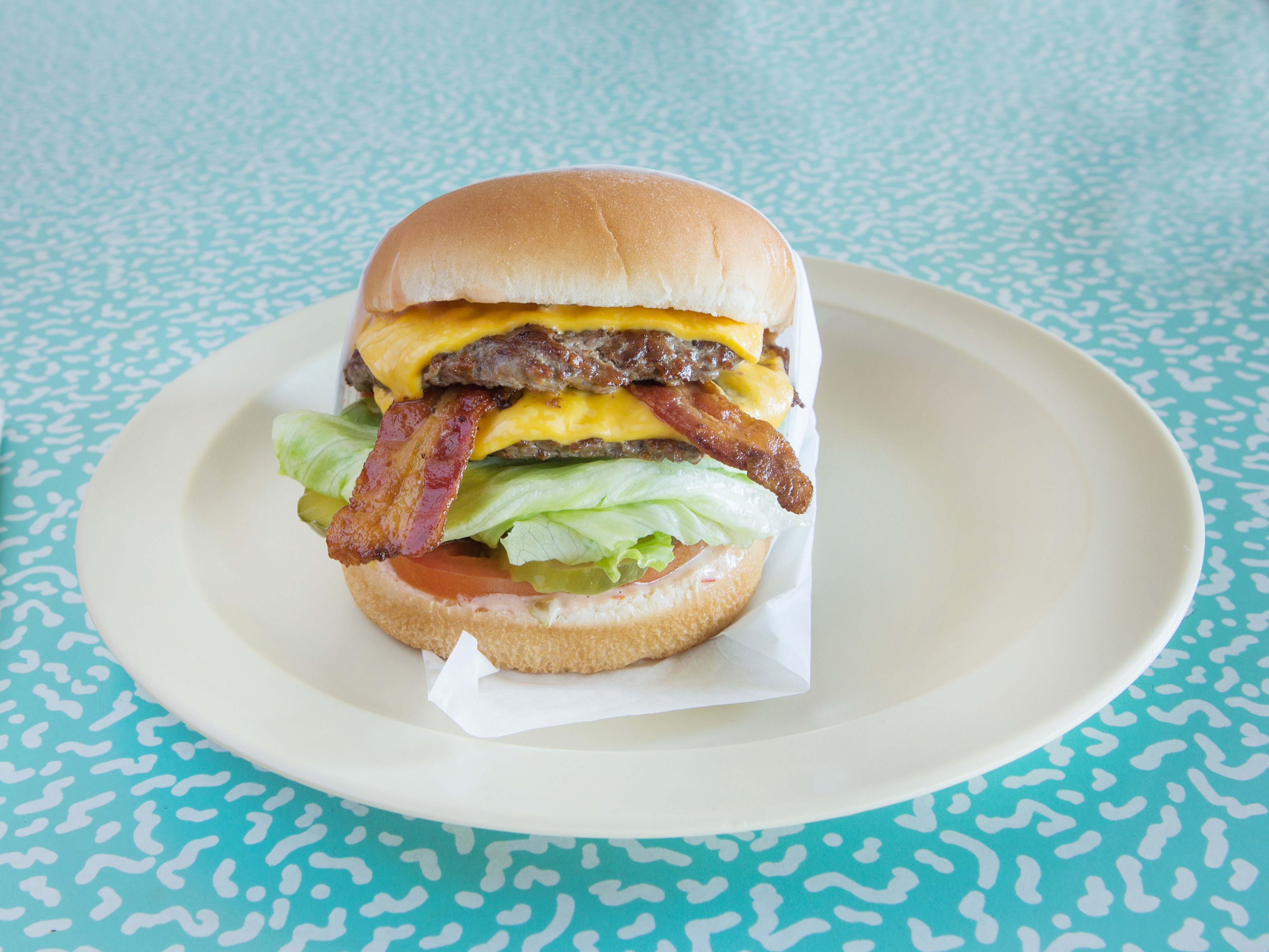 Order Double Bacon Cheeseburger food online from Tomboy store, Lawndale on bringmethat.com