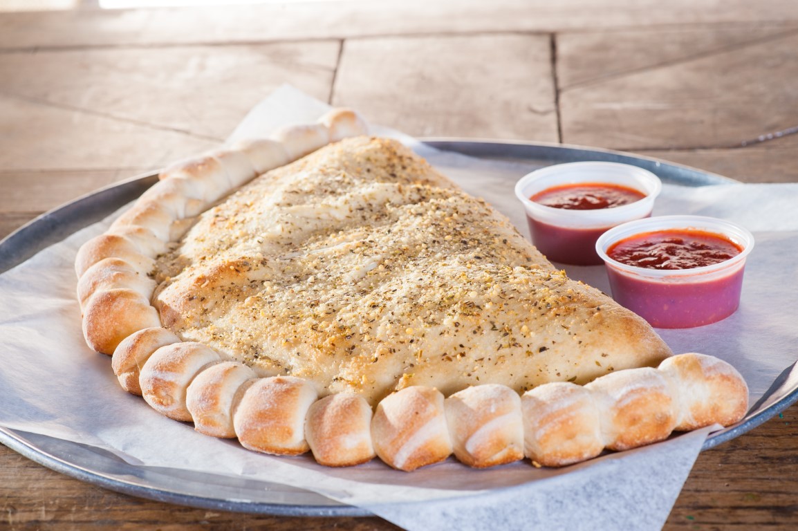 Order Small Traditional Calzone food online from Mama's Famous Pizza and Heros store, Tucson on bringmethat.com