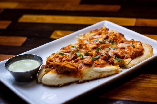 Order Butter Chicken Flatbread food online from Cowboys & Indians Tex-In Kitchen store, Houston on bringmethat.com