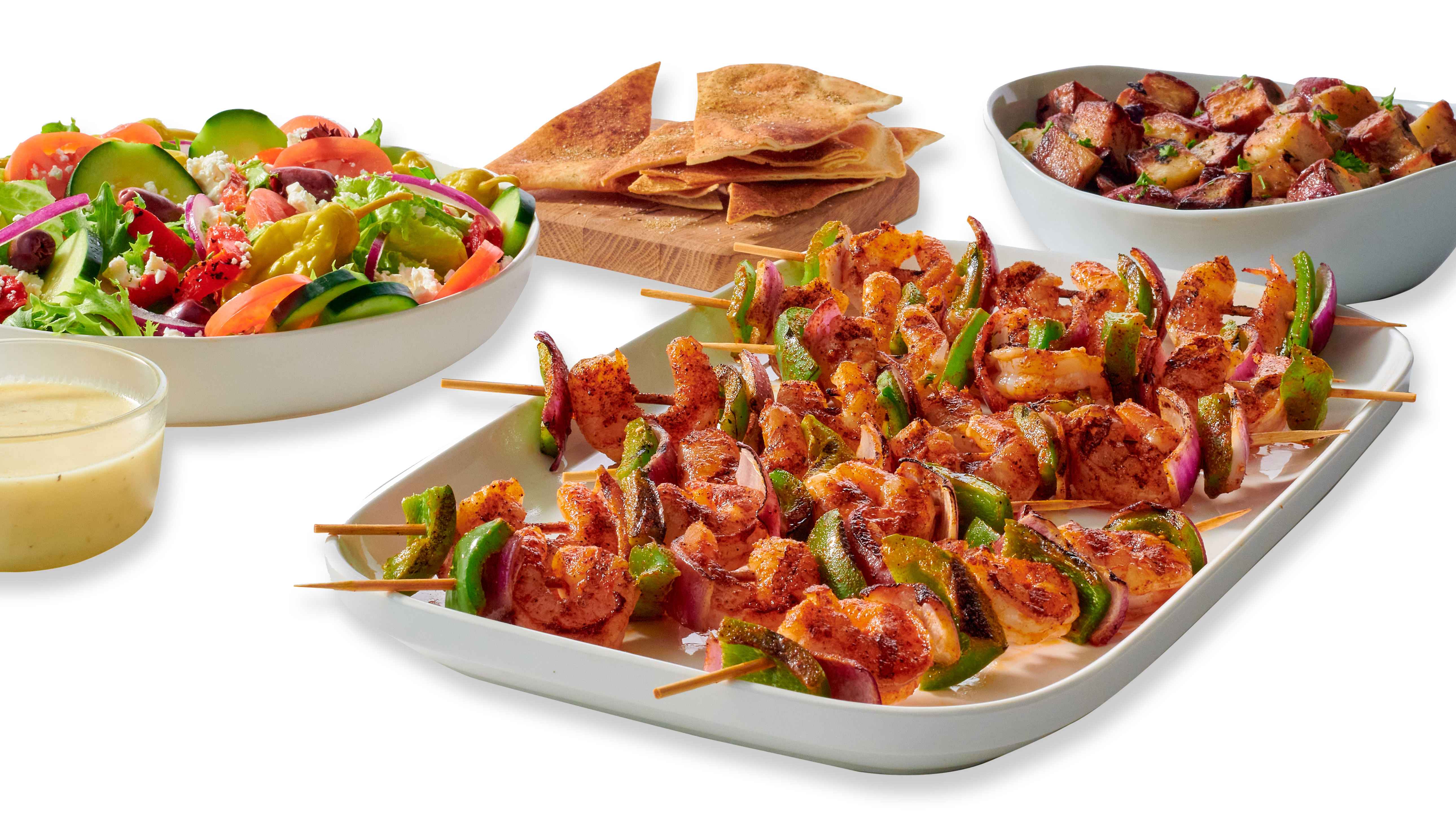 Order Shrimp Kebobs for 4 food online from Taziki Cafe store, Tuscaloosa on bringmethat.com