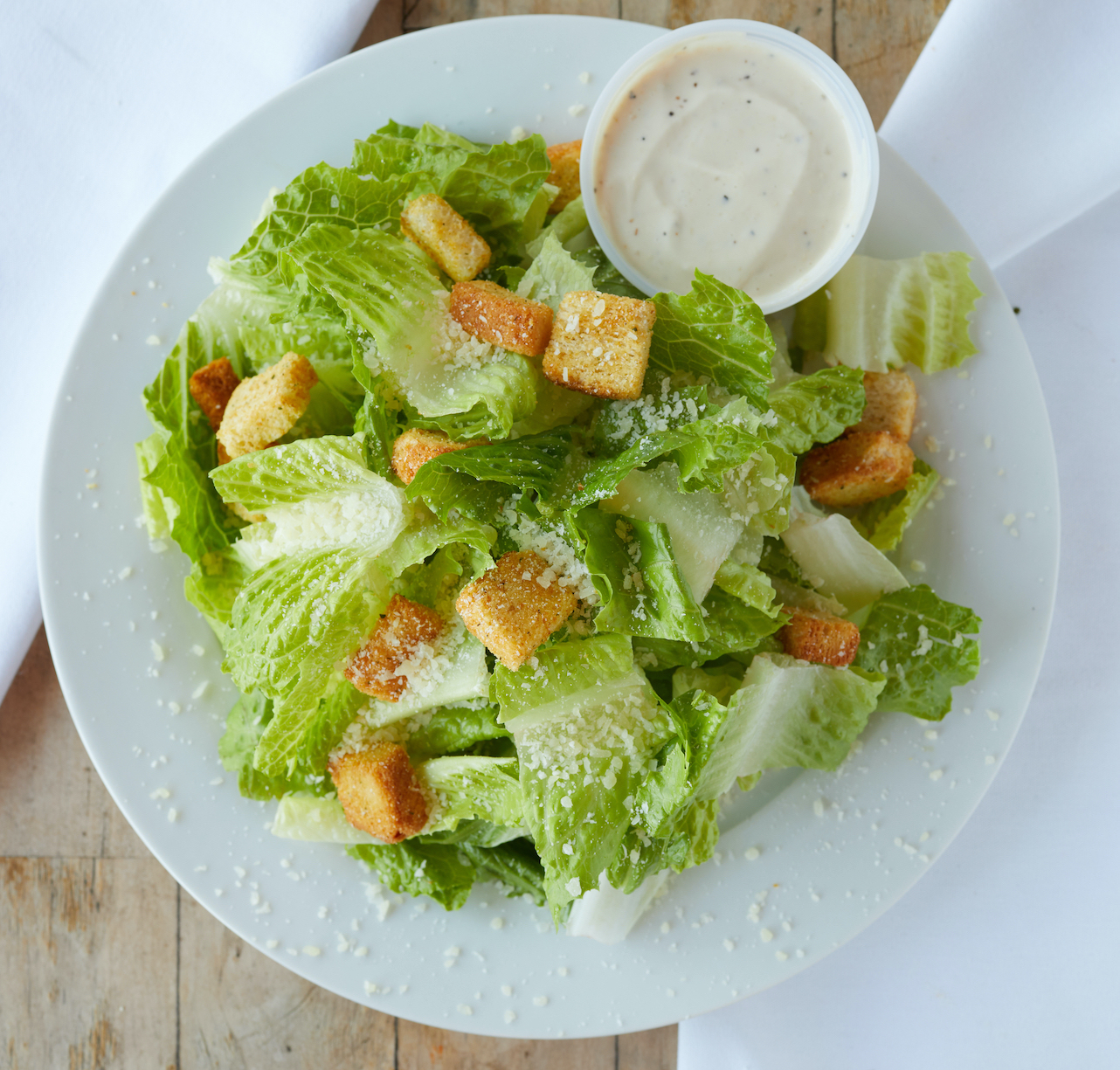 Order Caesar Salad Lg food online from Hard Times Pizza Co. store, Los Angeles on bringmethat.com