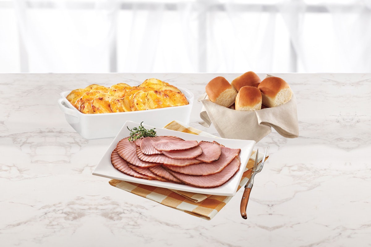 Order 1lb Ham Slices Dinner food online from The Honey Baked Ham store, Winchester on bringmethat.com