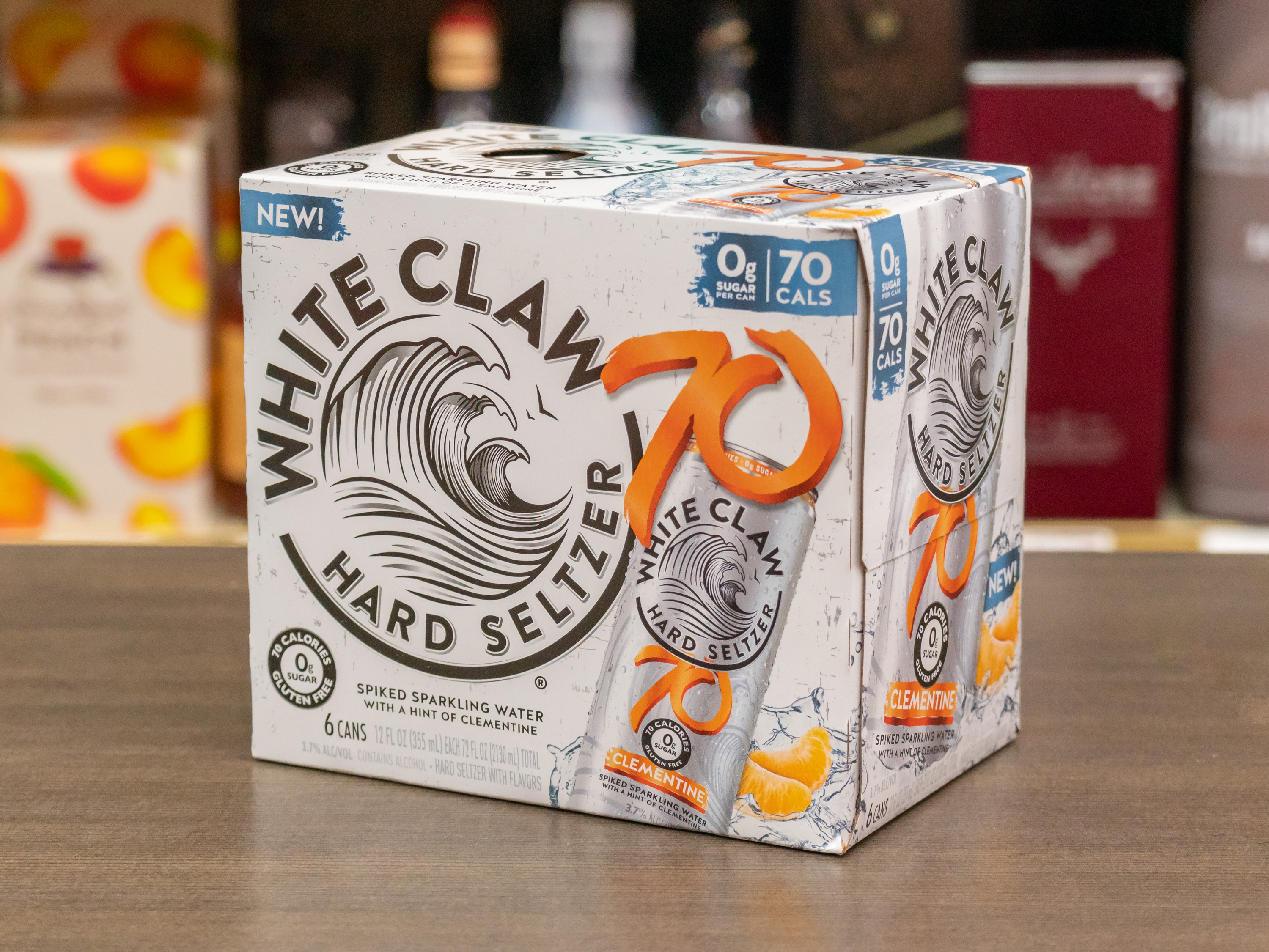 Order 6 Pack - 12 oz. Can of White Claw Mango Hard Seltzer (5.0% ABV) food online from Burlingame Liquor store, Burlingame on bringmethat.com