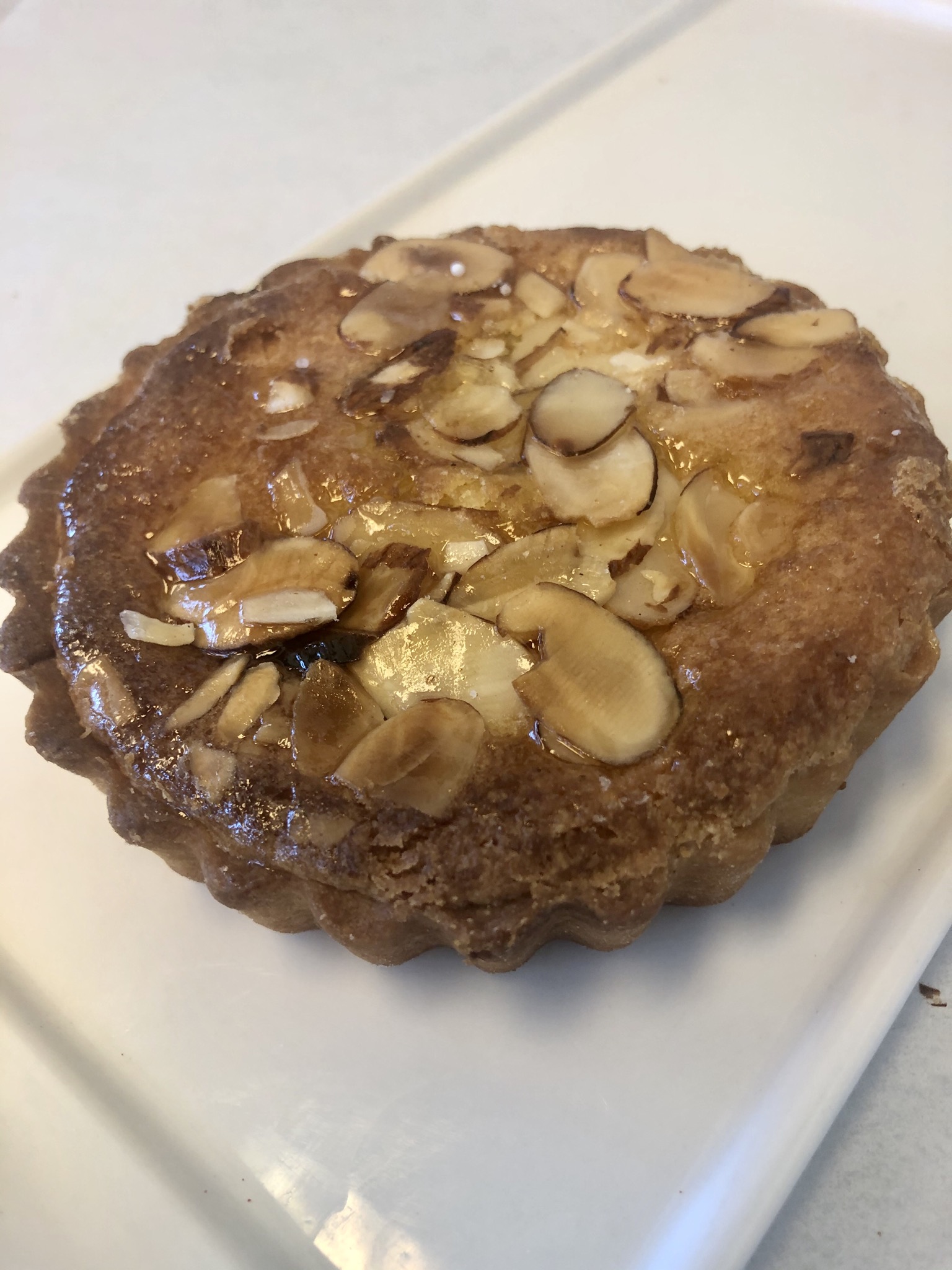 Order Almond Tart food online from Dore Bakery store, Brentwood on bringmethat.com