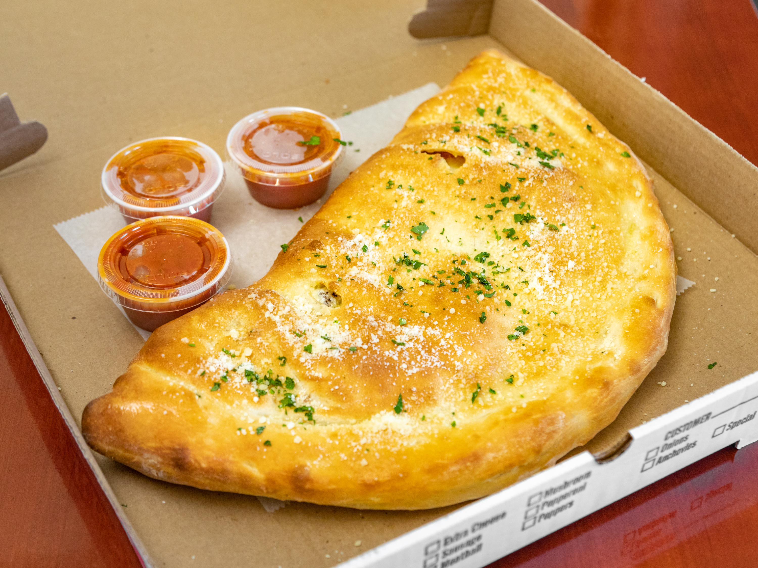 Order Cheese Calzone food online from Millie's Kitchen store, Westfield on bringmethat.com