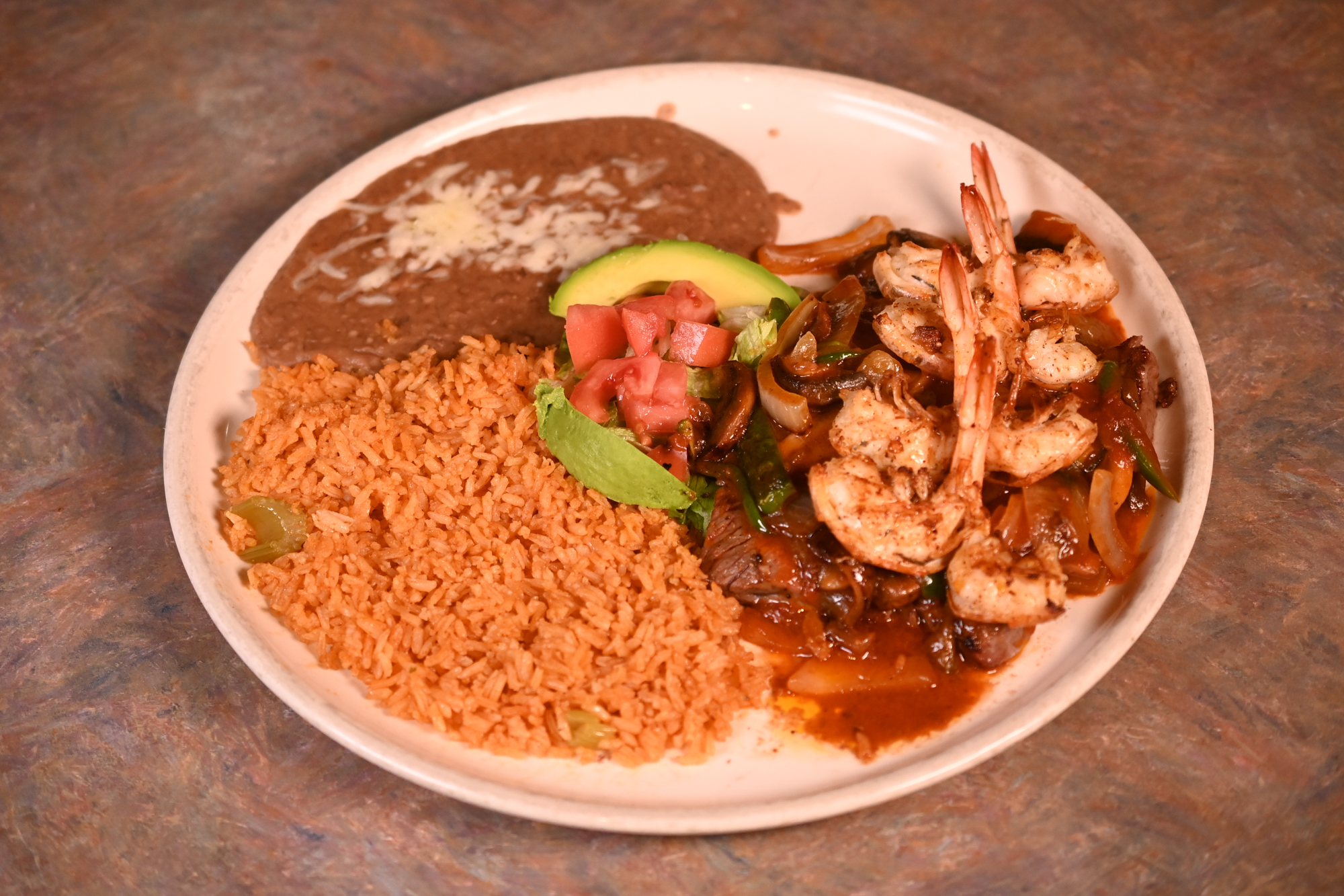 Order RIB EYE AND SHRIMP food online from Ixtapa Grill Family Mexican Restaurant store, Hamden on bringmethat.com