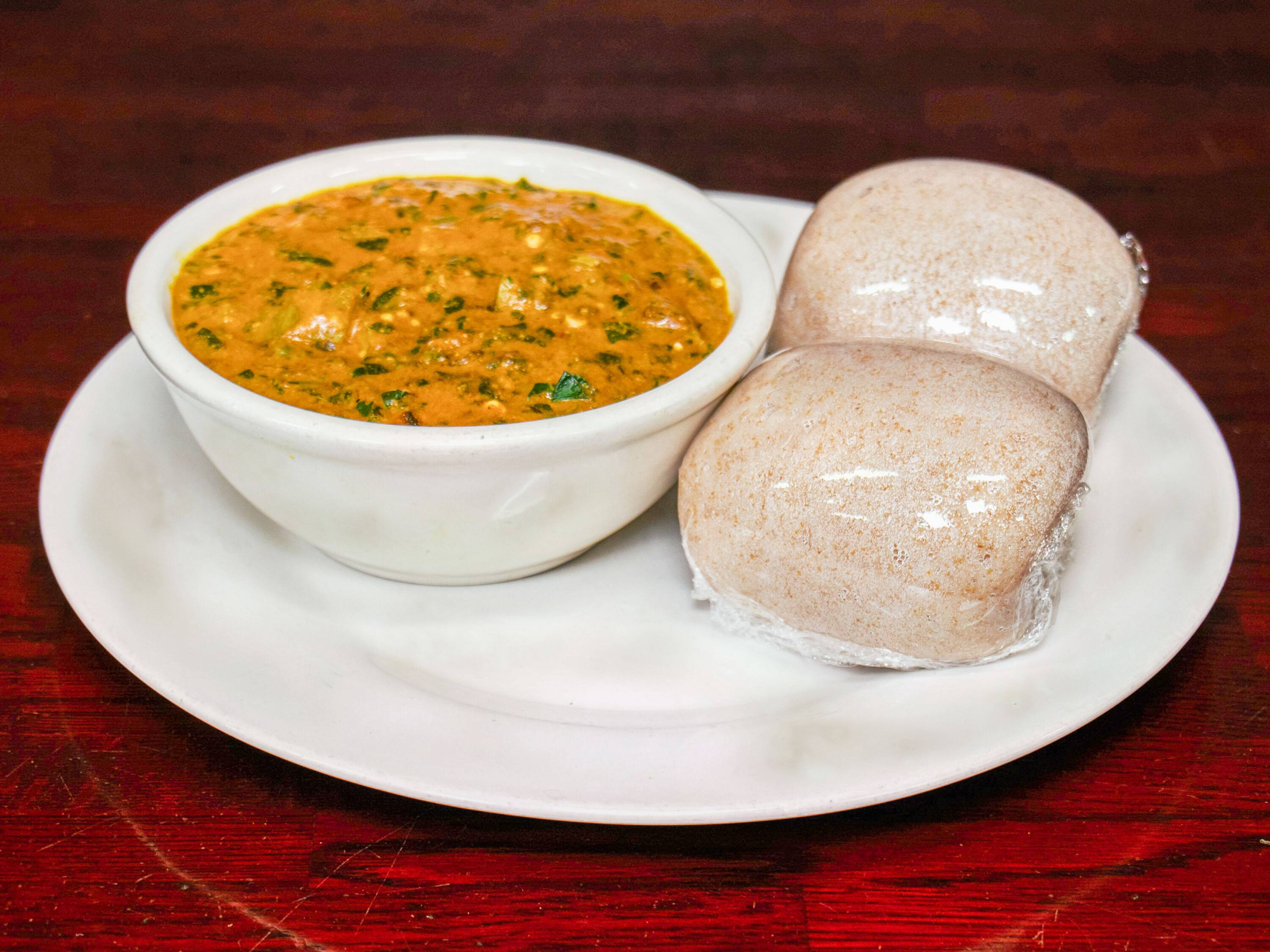 Order Okra and Ogbono Soup with Goat Meat Only food online from De Ranch Restaurant store, Hyattsville on bringmethat.com