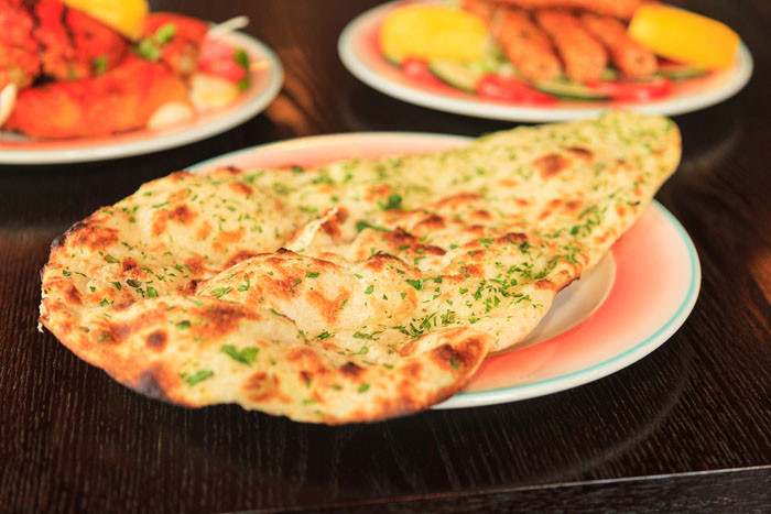 Order Butter Naan food online from Kabab Palace store, Redmond on bringmethat.com